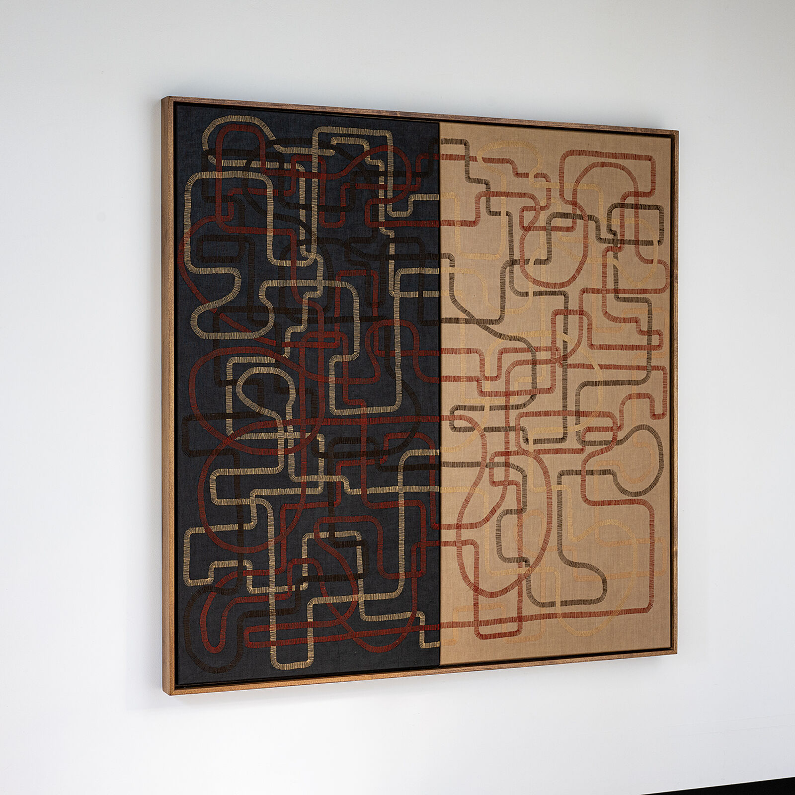 A painting hanging on a wall in a room.