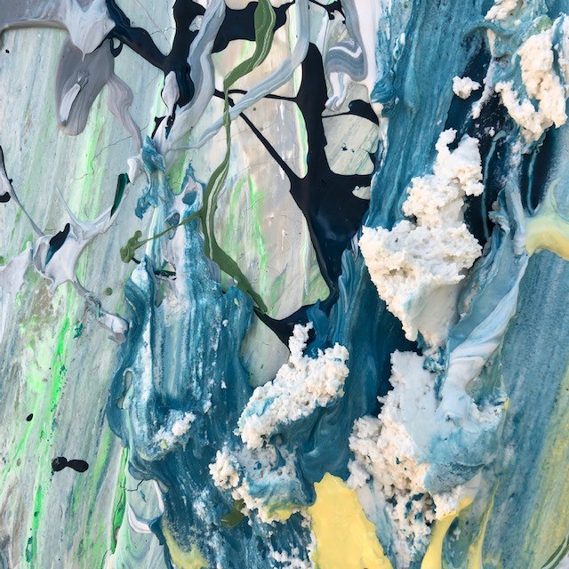 A close up of a painting on a wall. 