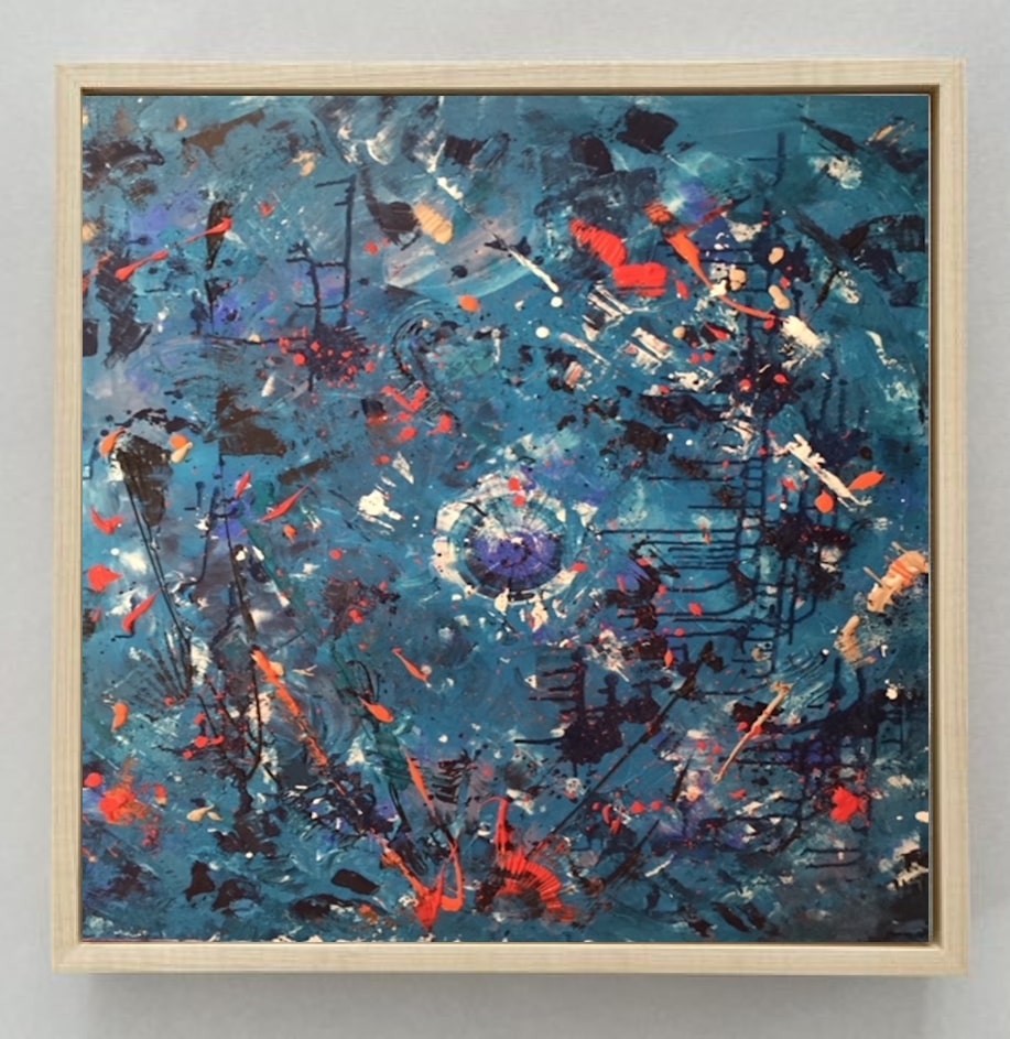 A painting hanging on a wall in a room.
