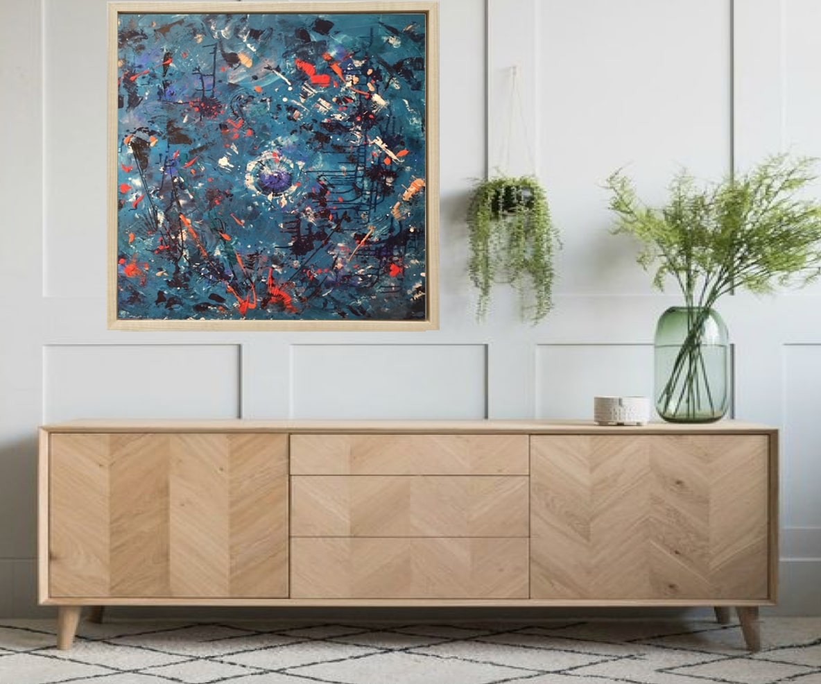 A painting hanging on a wall in a room.