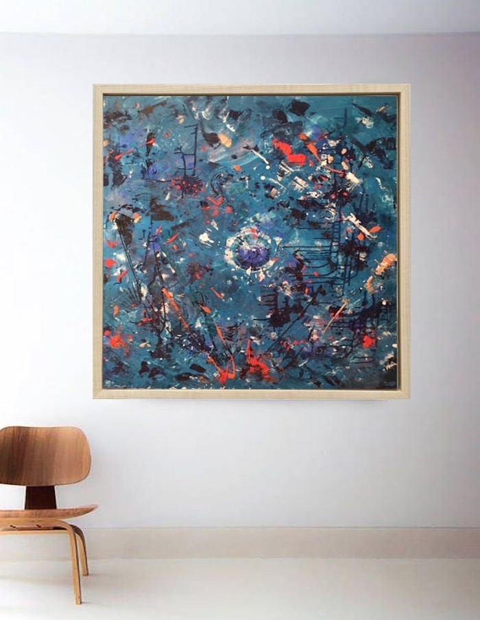 A painting hanging on a wall in a room.