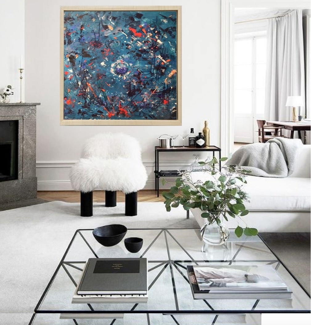 A painting hanging on a wall in a room.