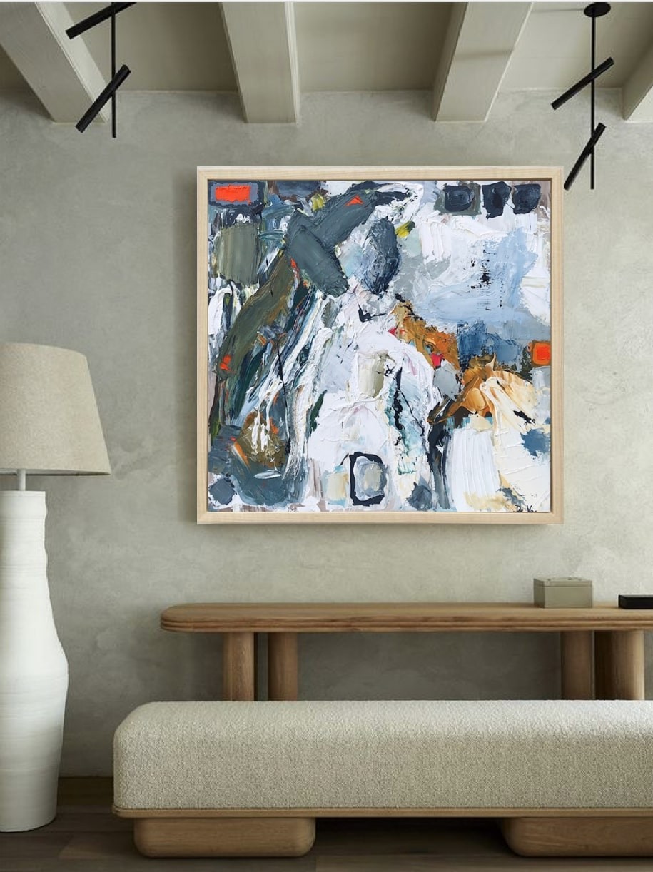 A painting of a horse in a wooden frame.