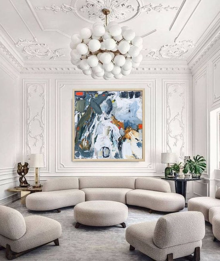 A painting of a horse in a wooden frame.