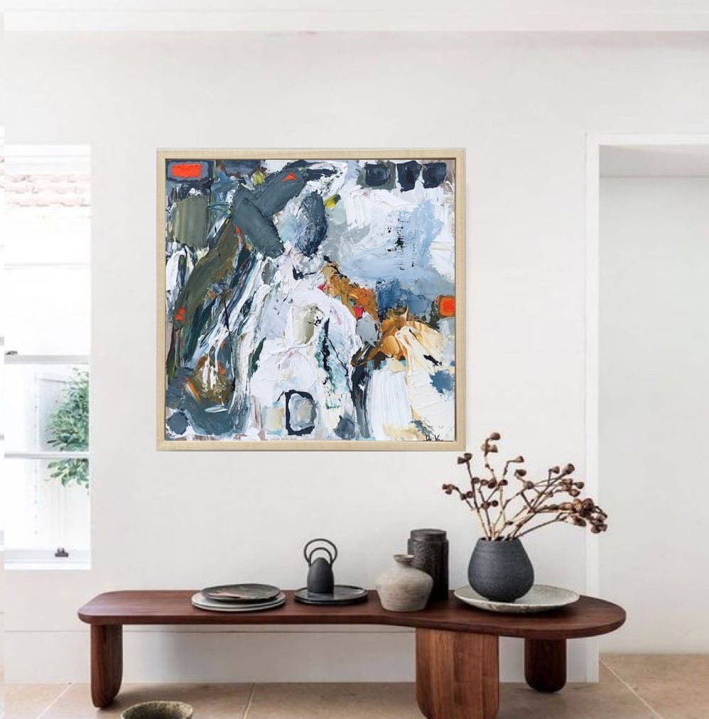 A painting of a horse in a wooden frame.