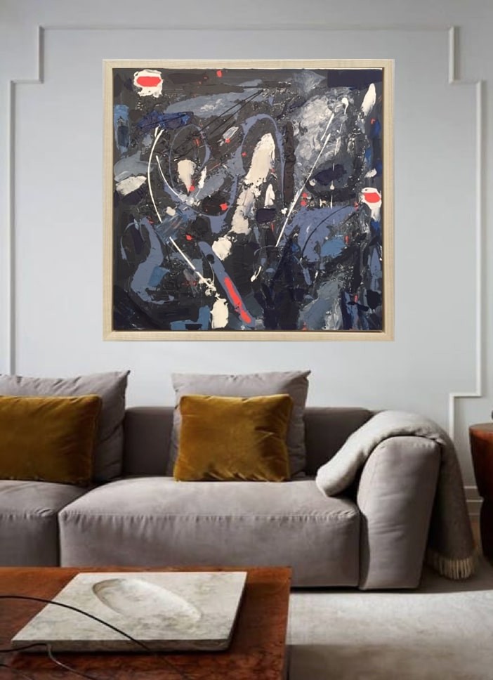 A painting hanging on a wall in a room.