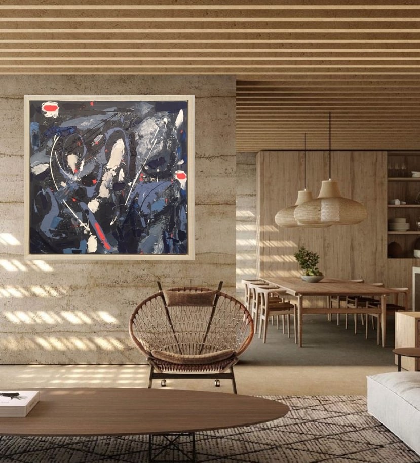 A painting hanging on a wall in a room.