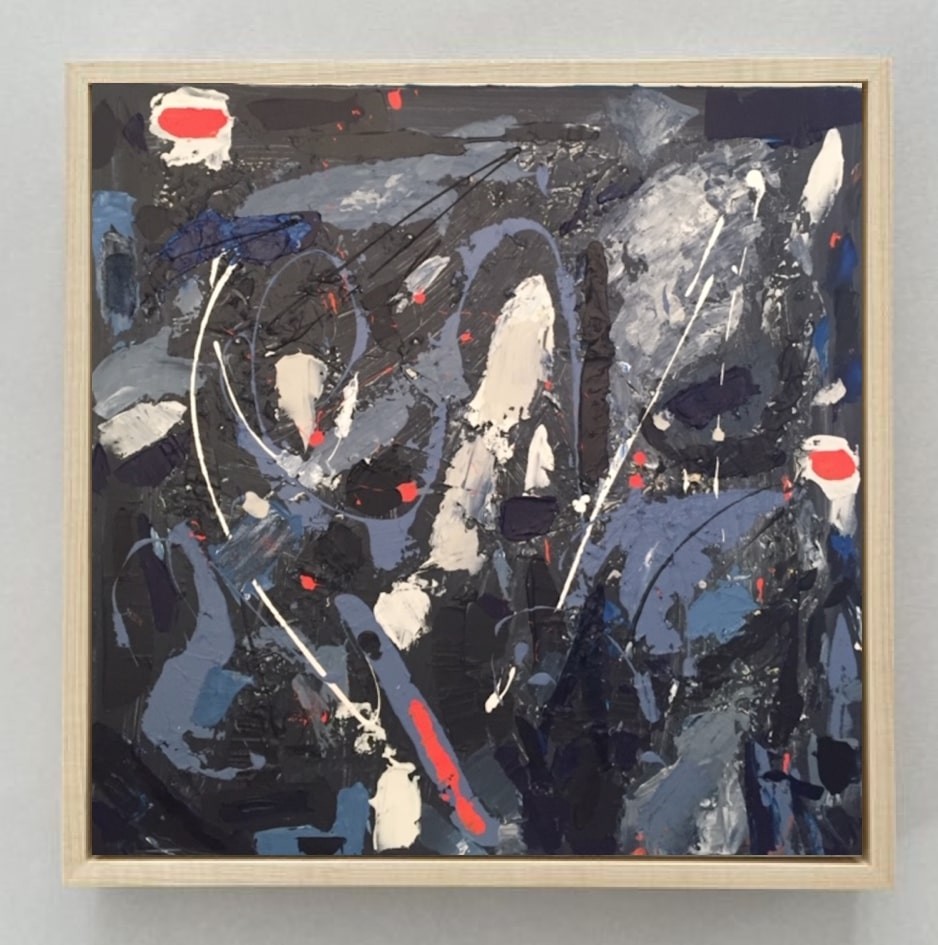 A painting hanging on a wall in a room.