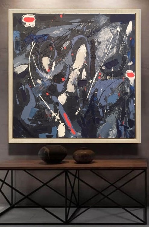 A painting hanging on a wall in a room.