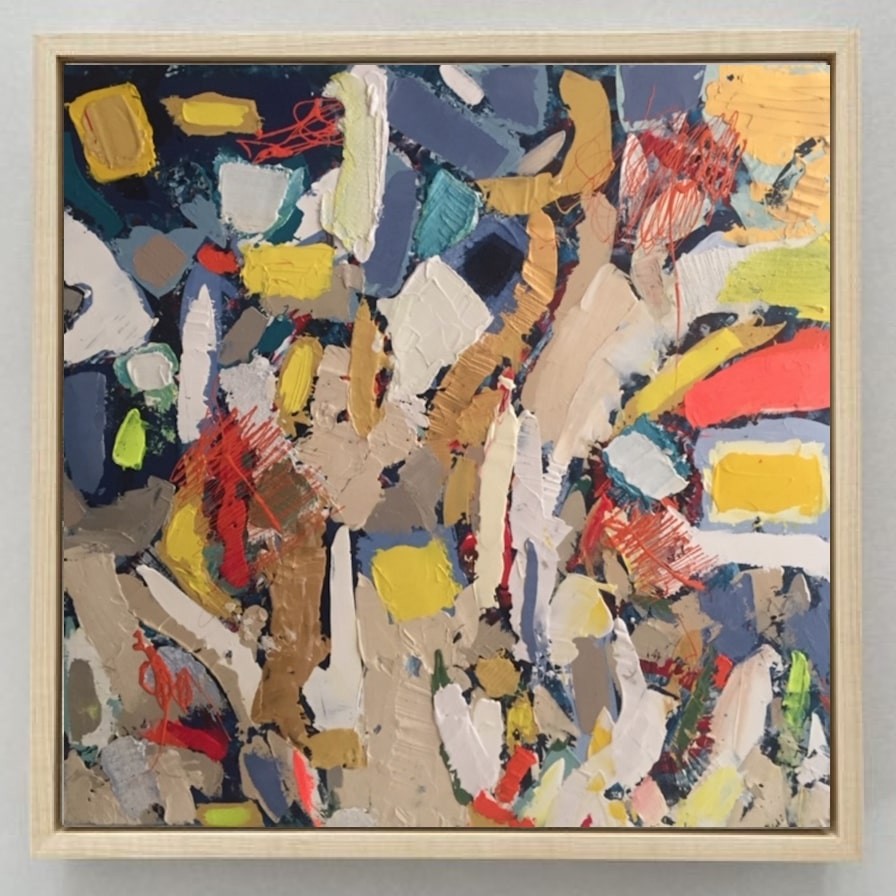 A painting in a gold frame on a white wall.