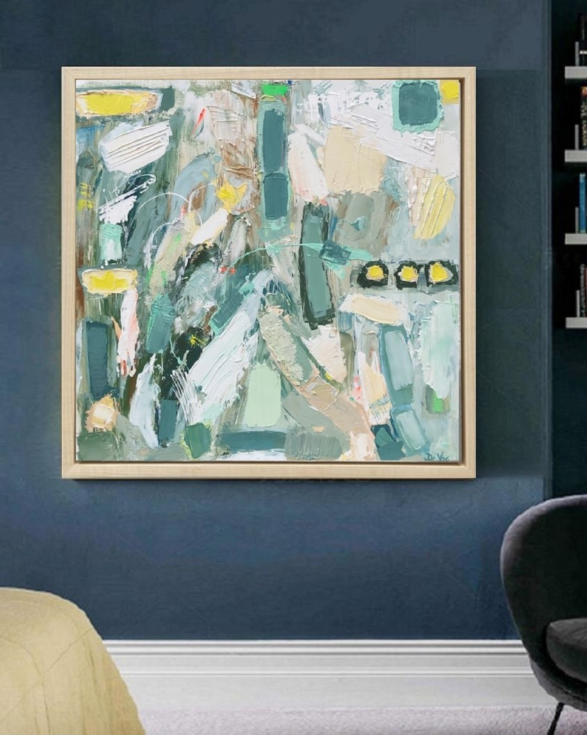 A painting hanging on a wall in a room.