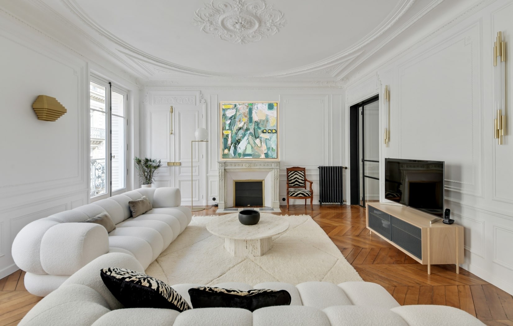 A painting hanging on a wall in a room.