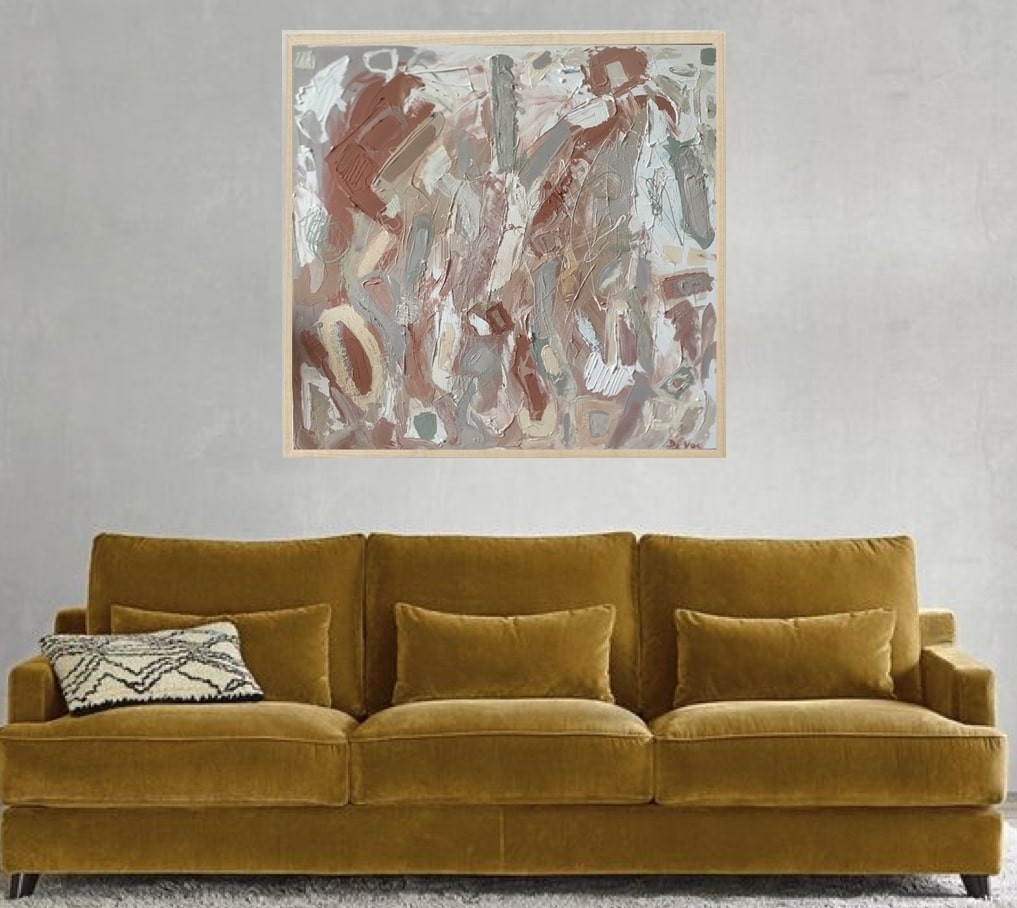 A painting with a wooden frame on a white wall.