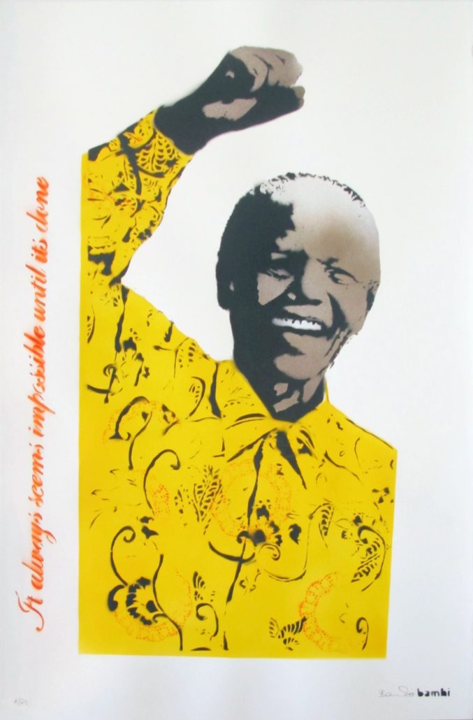 A poster of Nelson Mandela with a fist raised in the air.