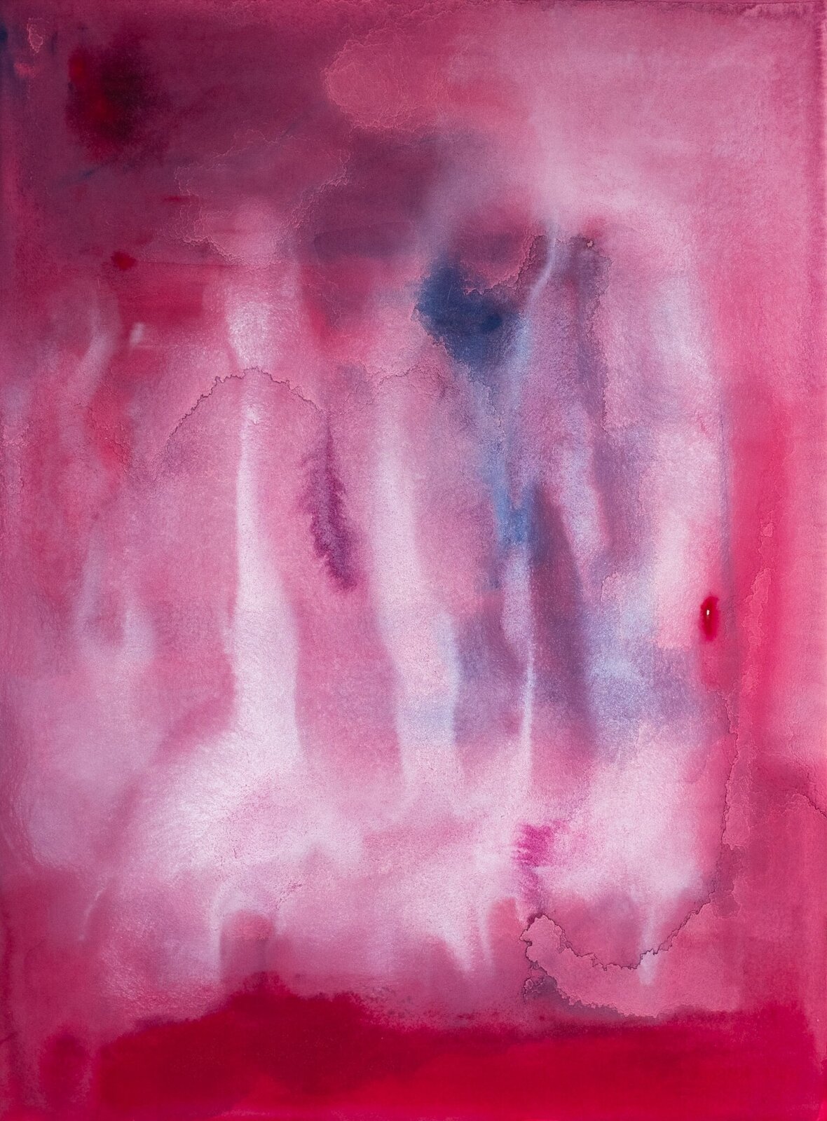 An abstract watercolor painting featuring a soft, dreamy composition of pink and red hues with a central blue shape.
