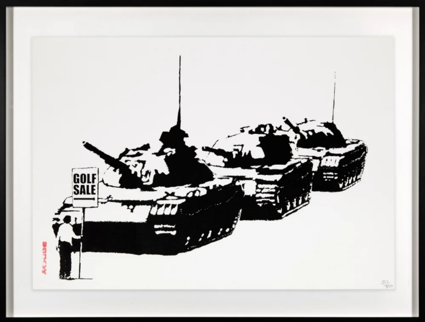 A stark black-and-white print juxtaposes military tanks with a golf course sale sign.
