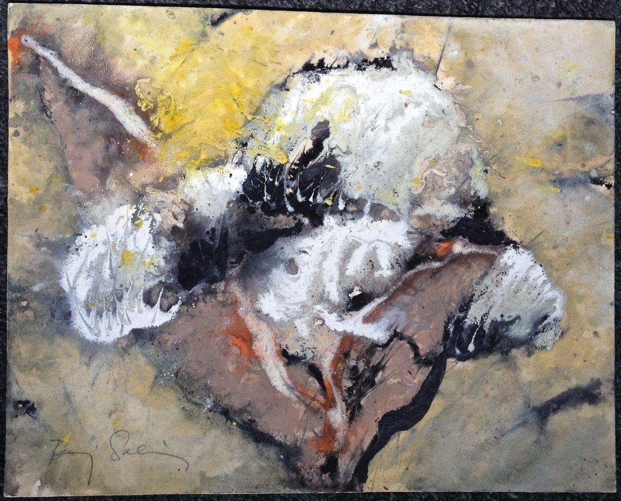 A painting of a skull on a piece of paper.