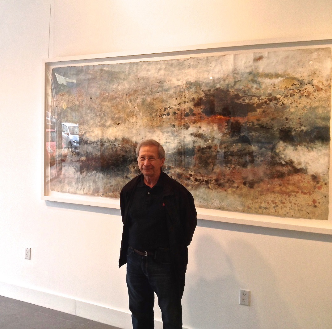 A painting of a black and white abstract painting on a gray background.