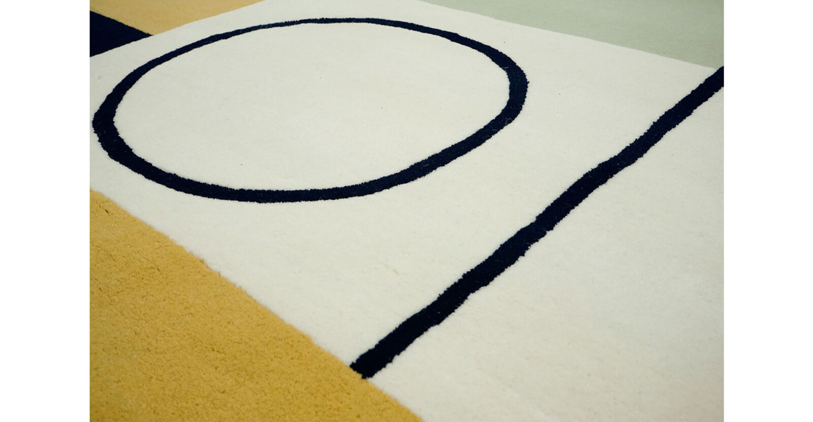 A rug with a geometric design on it. 