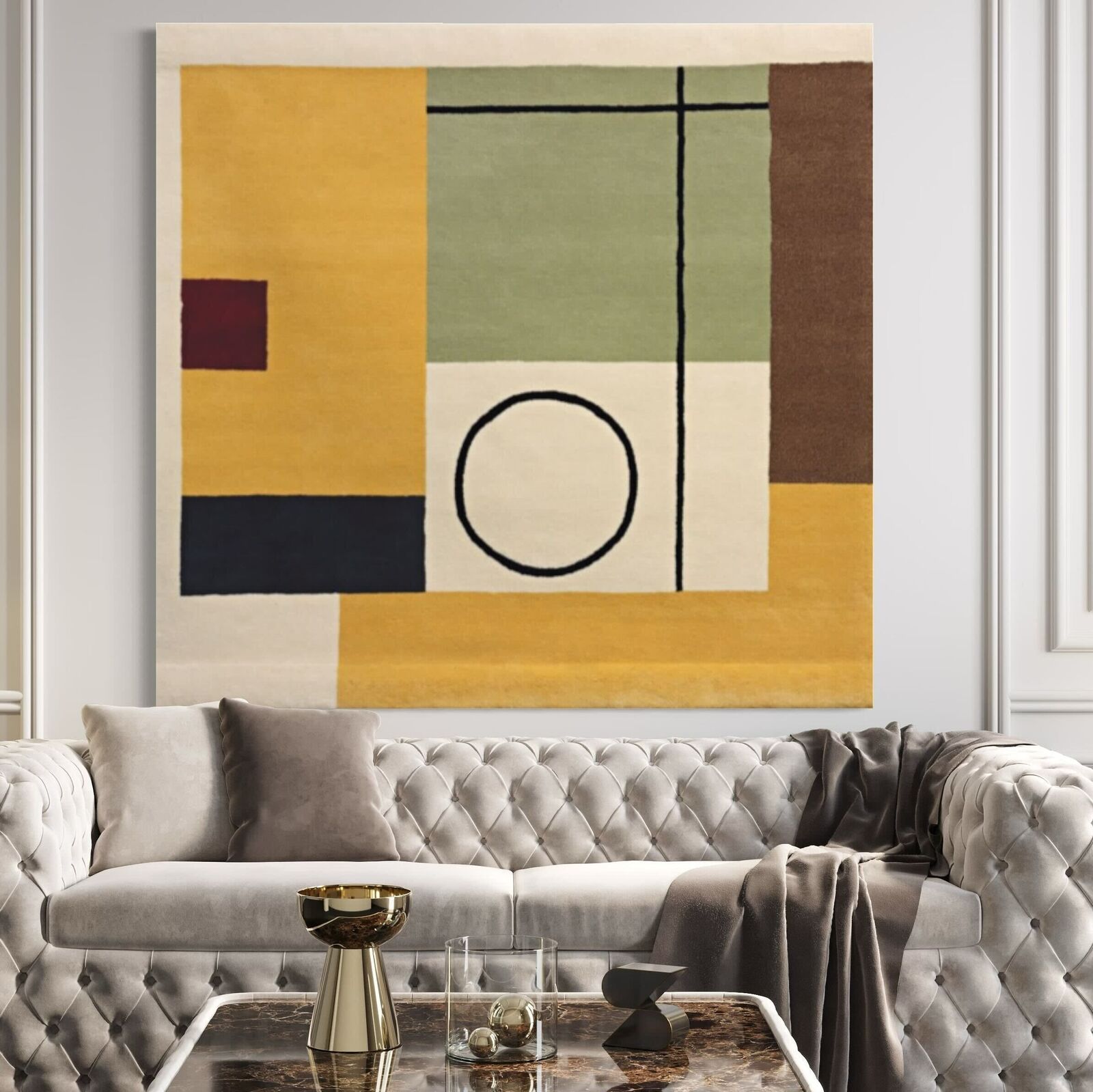 A modern living room featuring a tufted sofa and geometric abstract wall art.