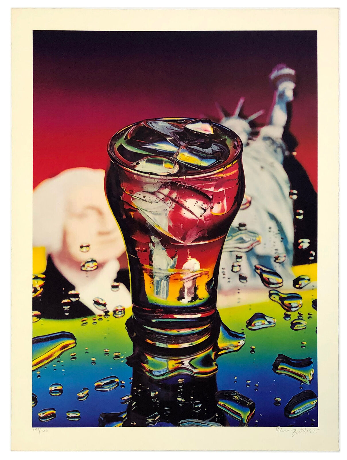 A picture of a glass of soda with the Statue of Liberty in the background.