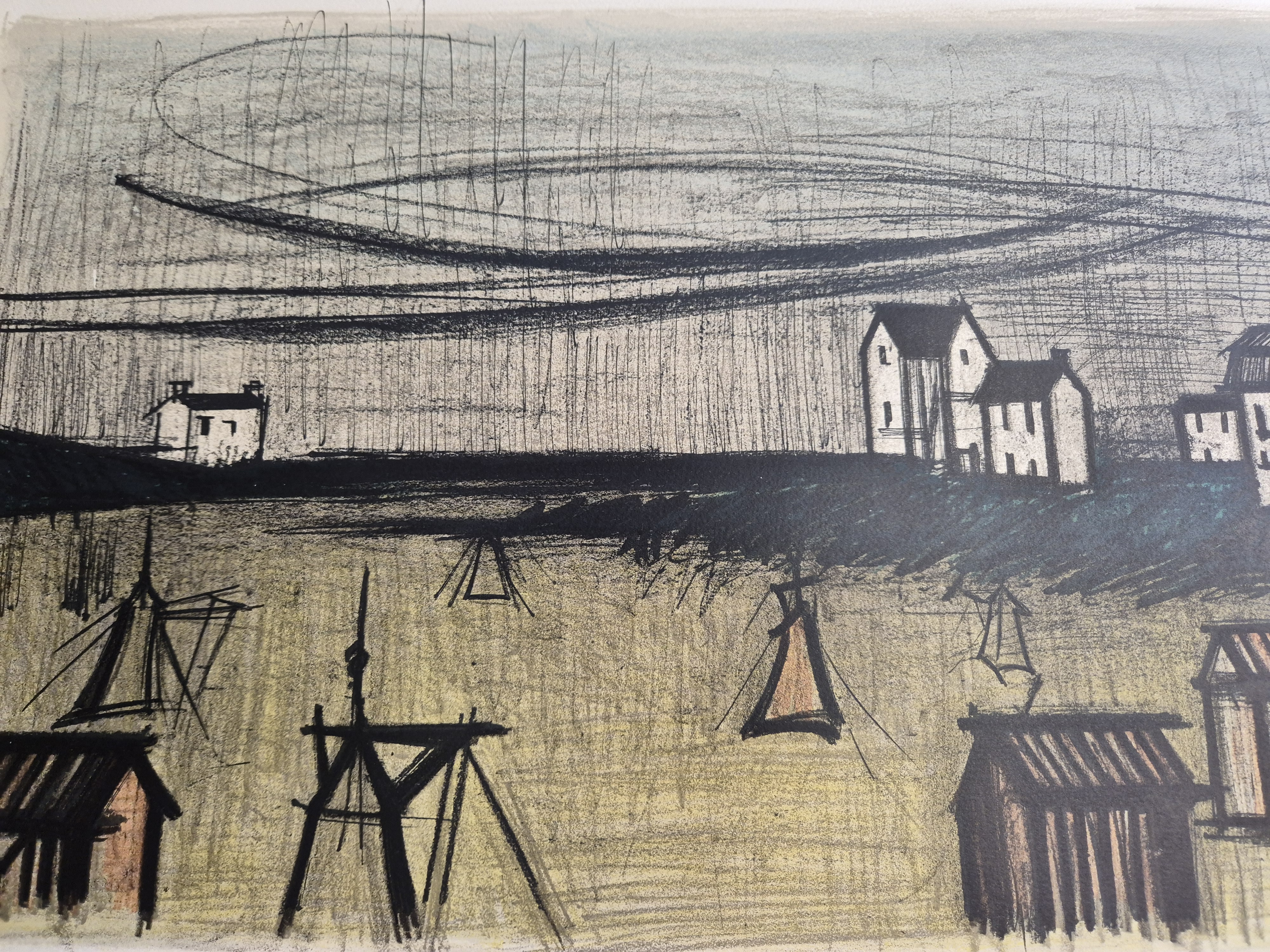 A black and white drawing of a small town by the water.