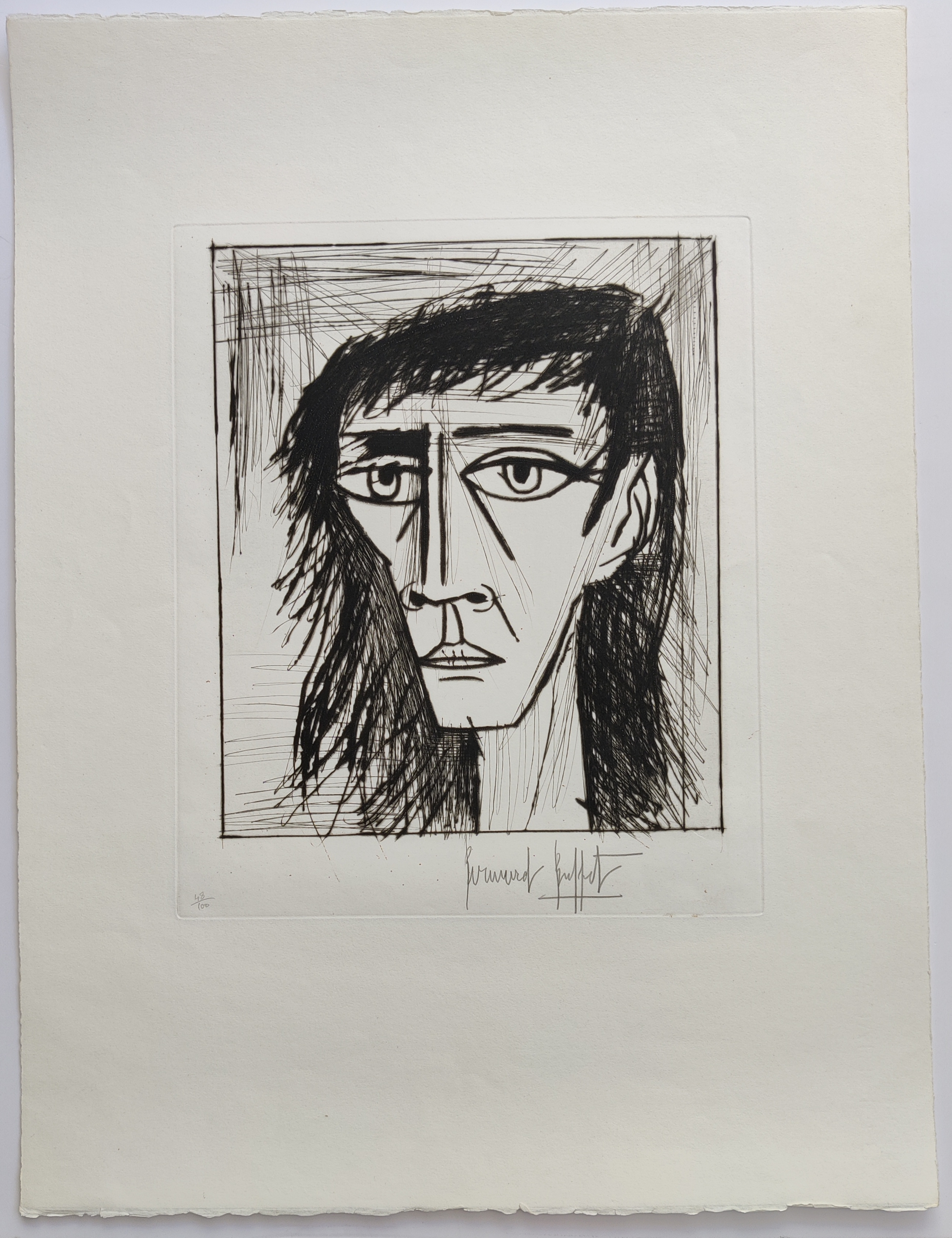 A stark black-and-white portrait in the style of Cubism, featuring a face with elongated features and heavy shading.