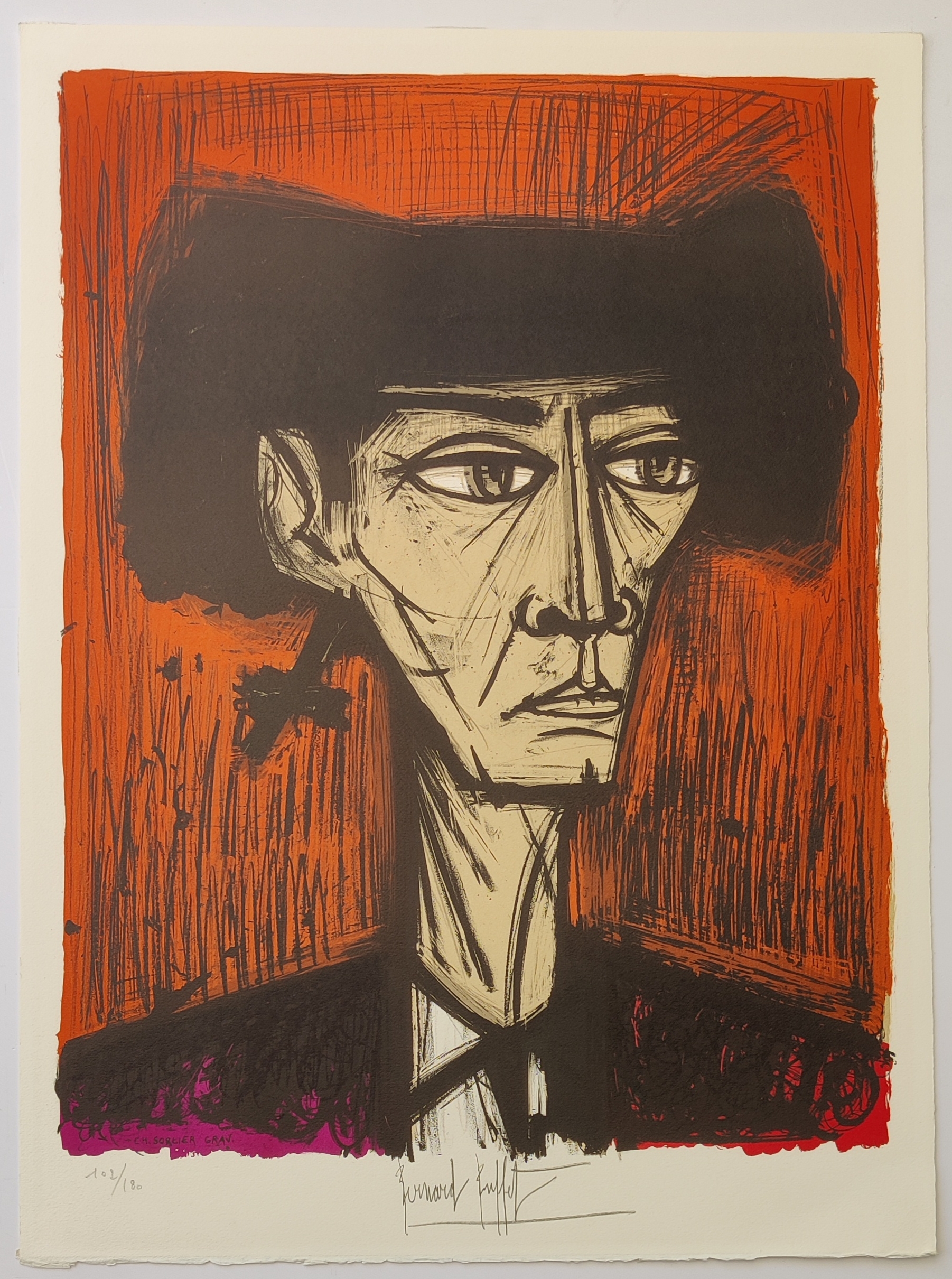 A stylized portrait of a figure in a hat against a bold orange background.