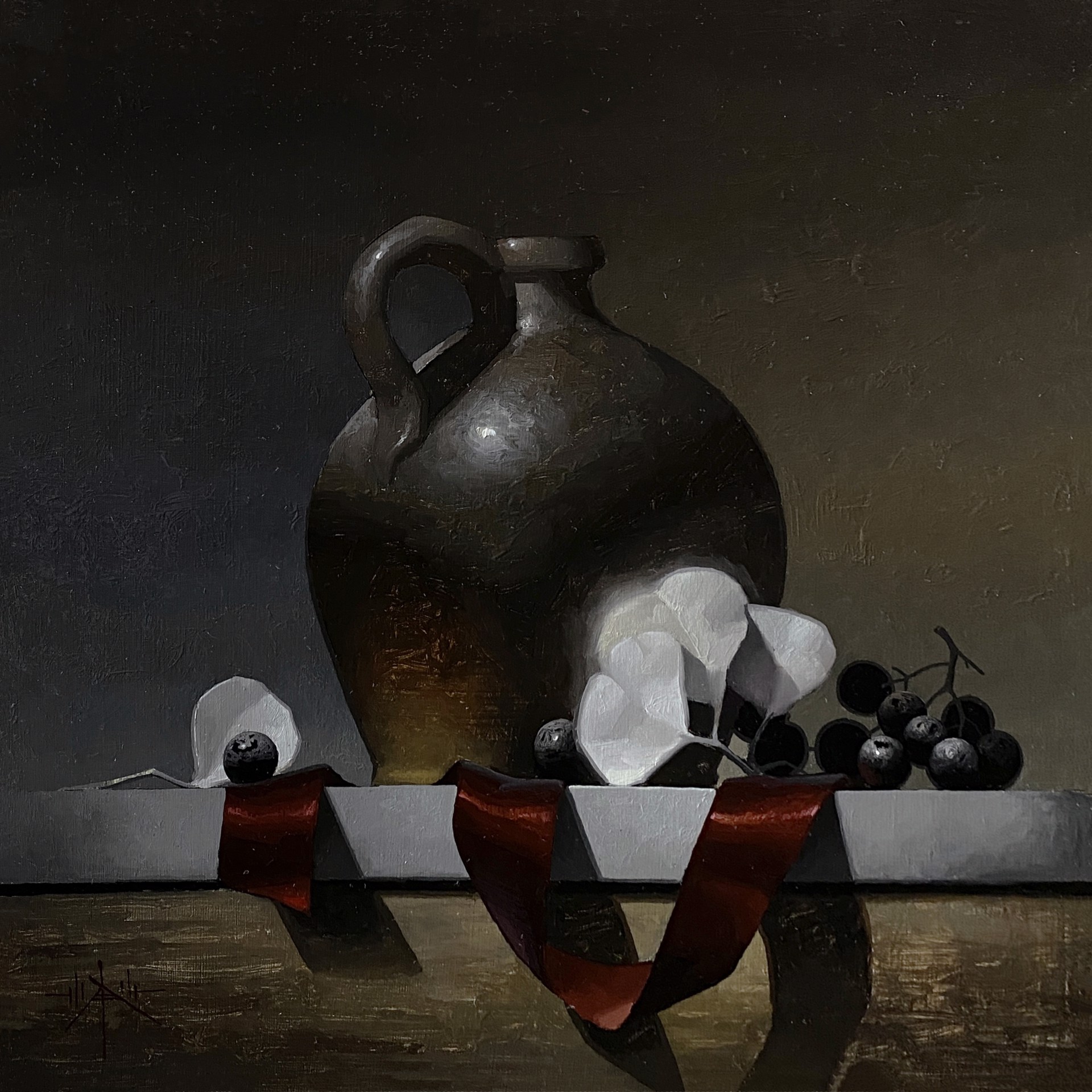A dark still life featuring a ceramic jug, white flowers, and grapes on a ribbon-draped ledge.