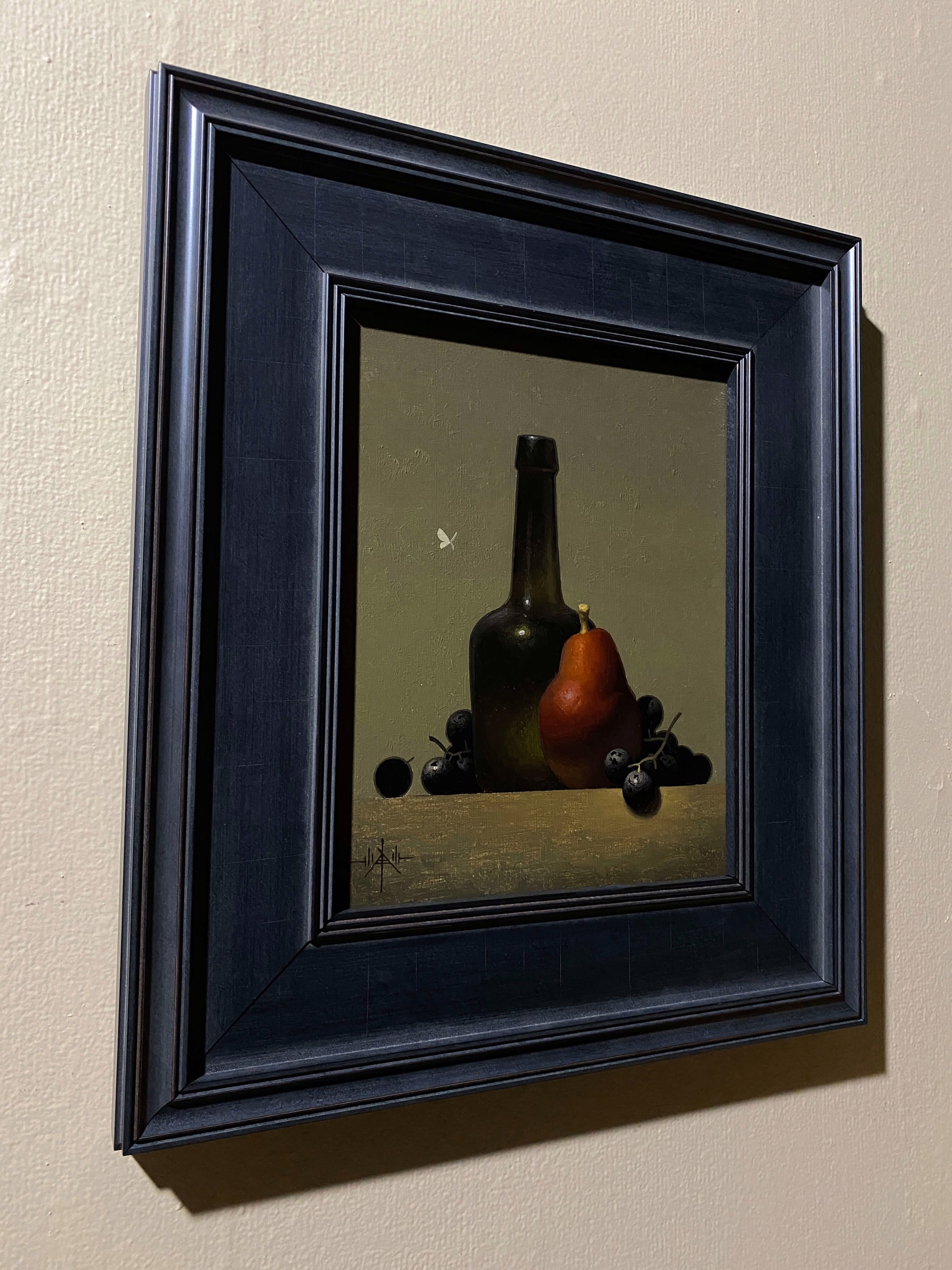 A still life painting featuring a dark bottle, a pear, and clusters of dark berries on a wooden surface.