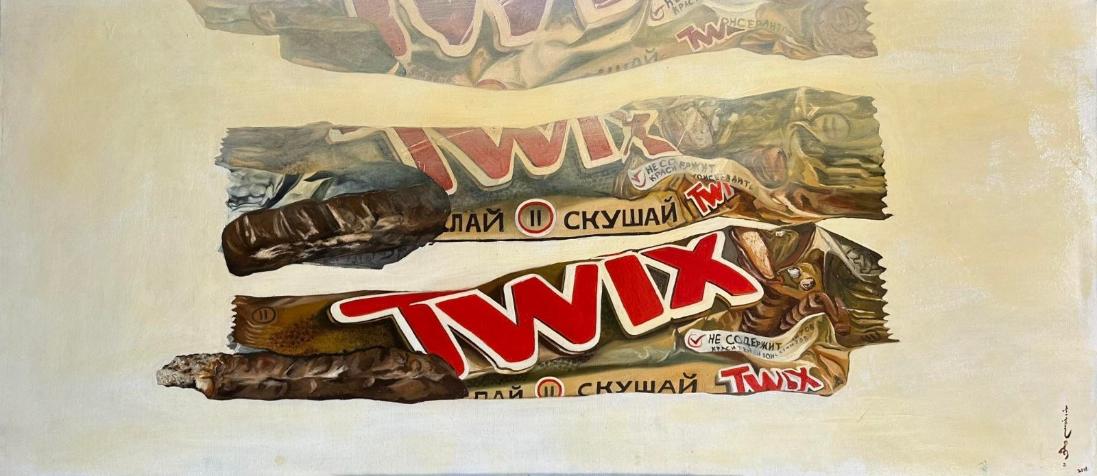 A layered composition of chocolate bars with bold red lettering and textured wrappers.