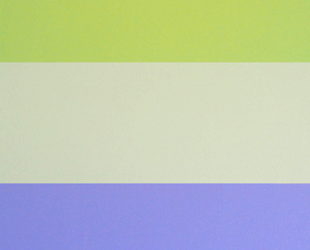A pink, green, blue, and purple striped paper on a white background.