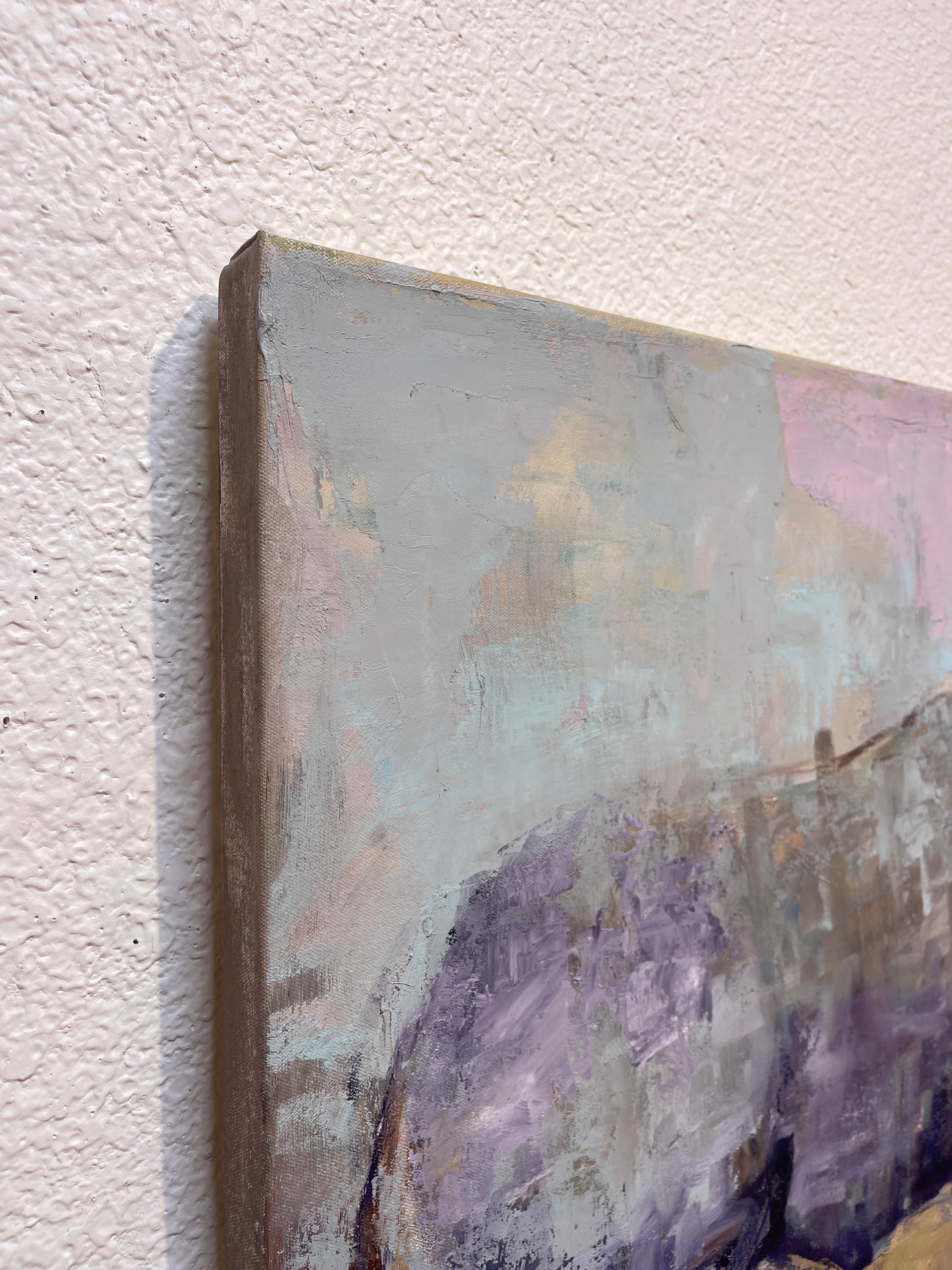 A painting of a bison standing in a field.