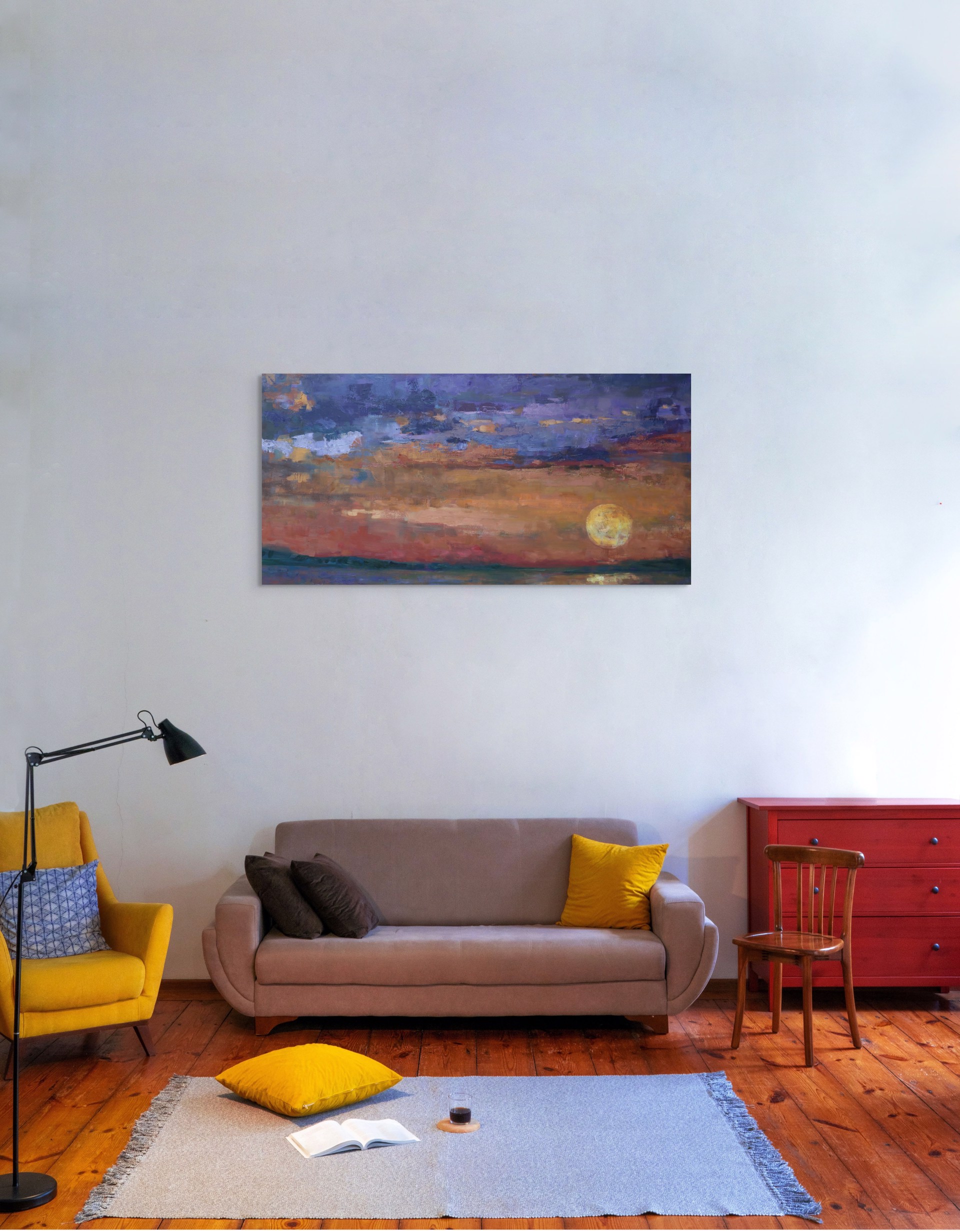 A painting of a sunset over a body of water.