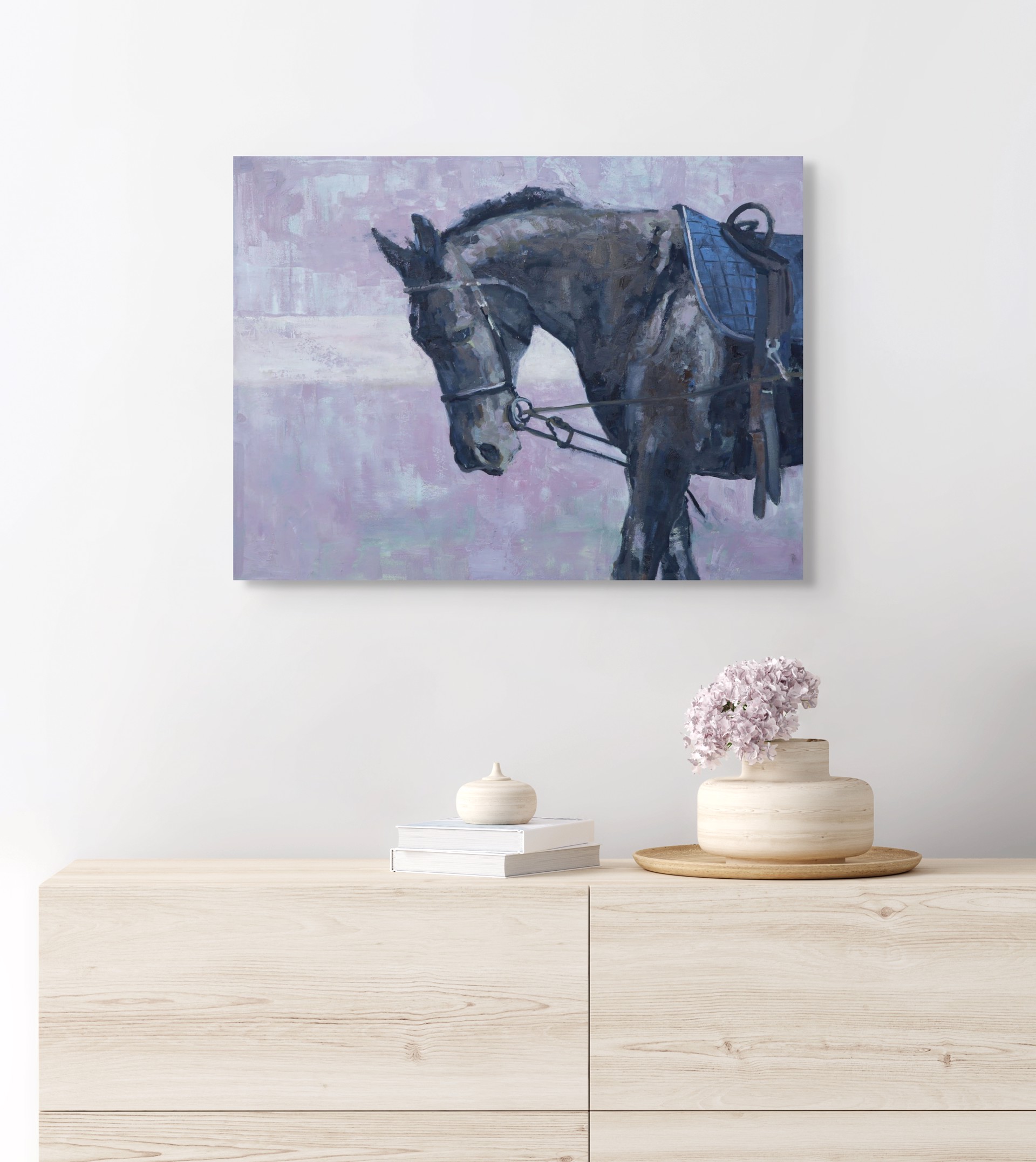 A painting of a horse with a saddle on it's back.