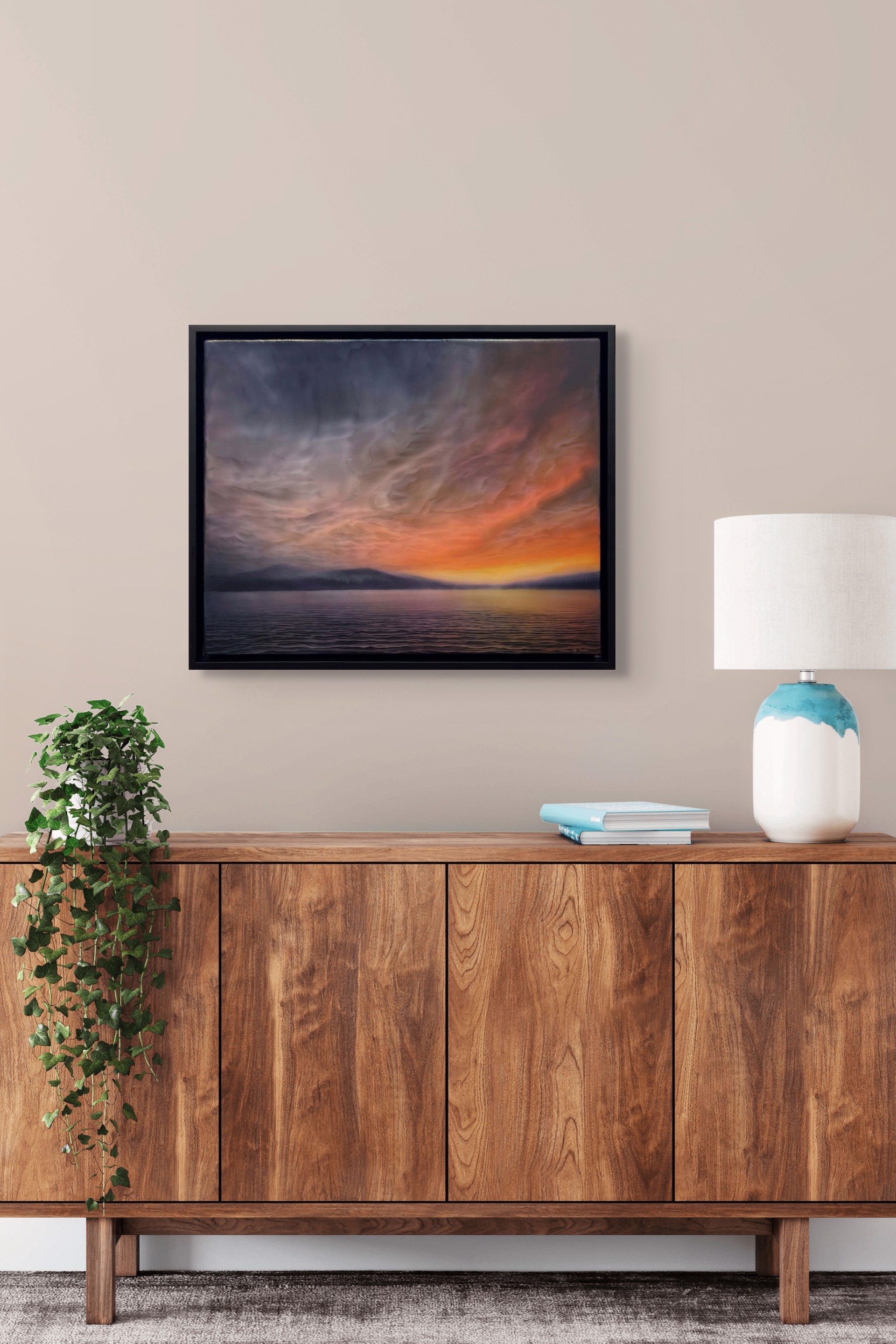 "A dramatic seascape at twilight featuring a textured sky and distant mountains."