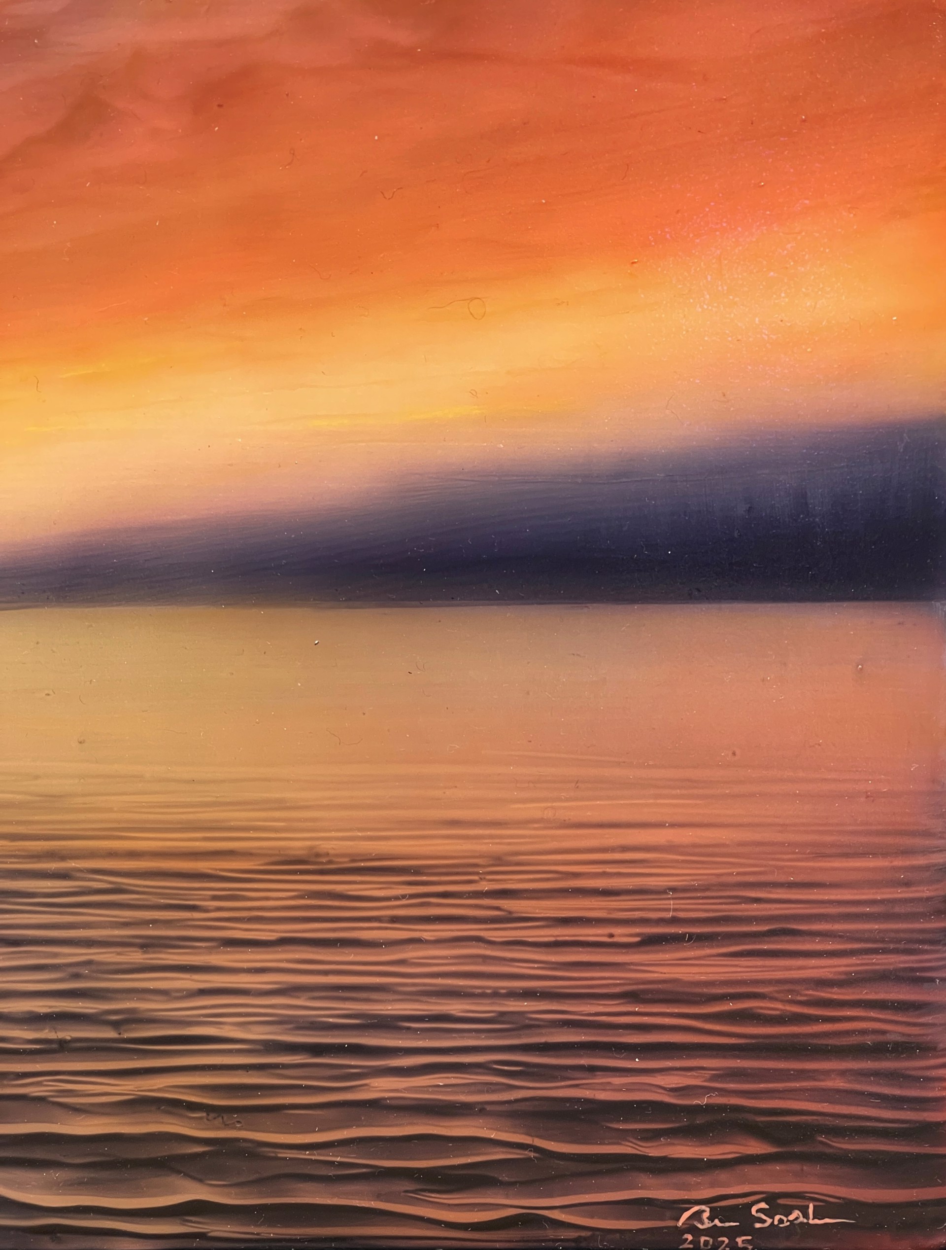 "A dramatic seascape at twilight featuring a textured sky and distant mountains."