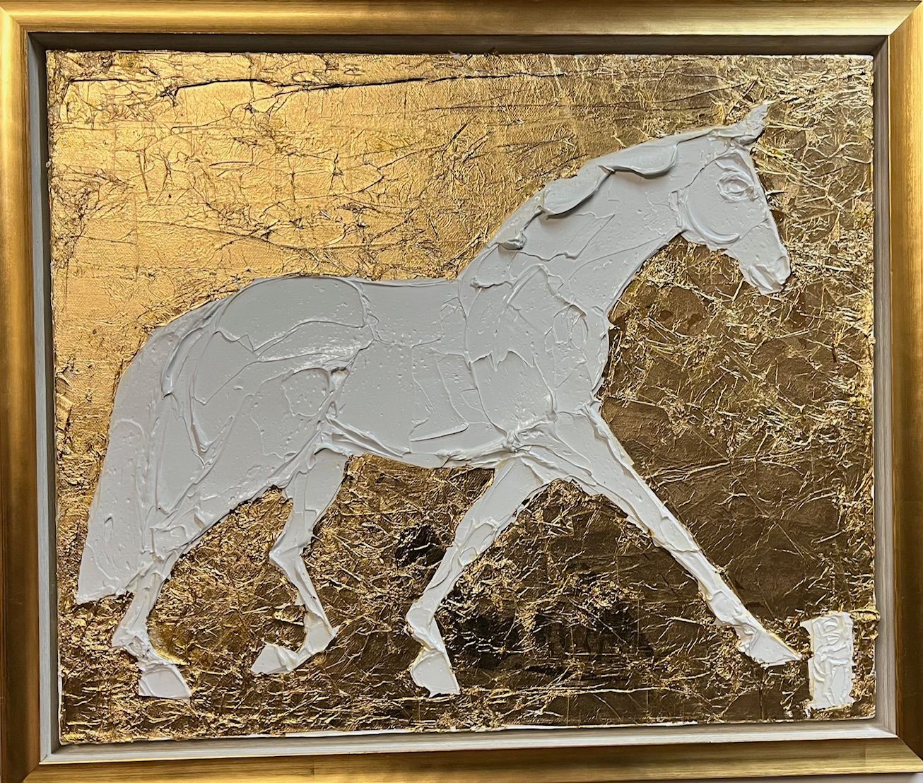 A thick, white horse silhouette set against a textured gold background.