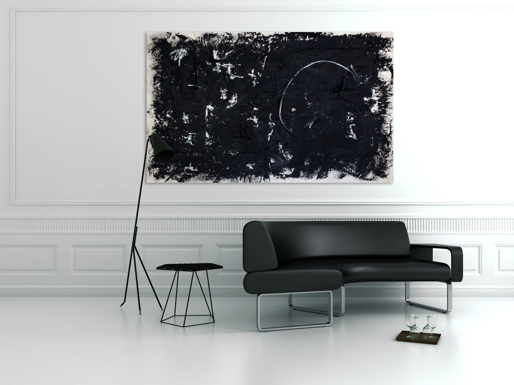 A black and white painting on a white wall.