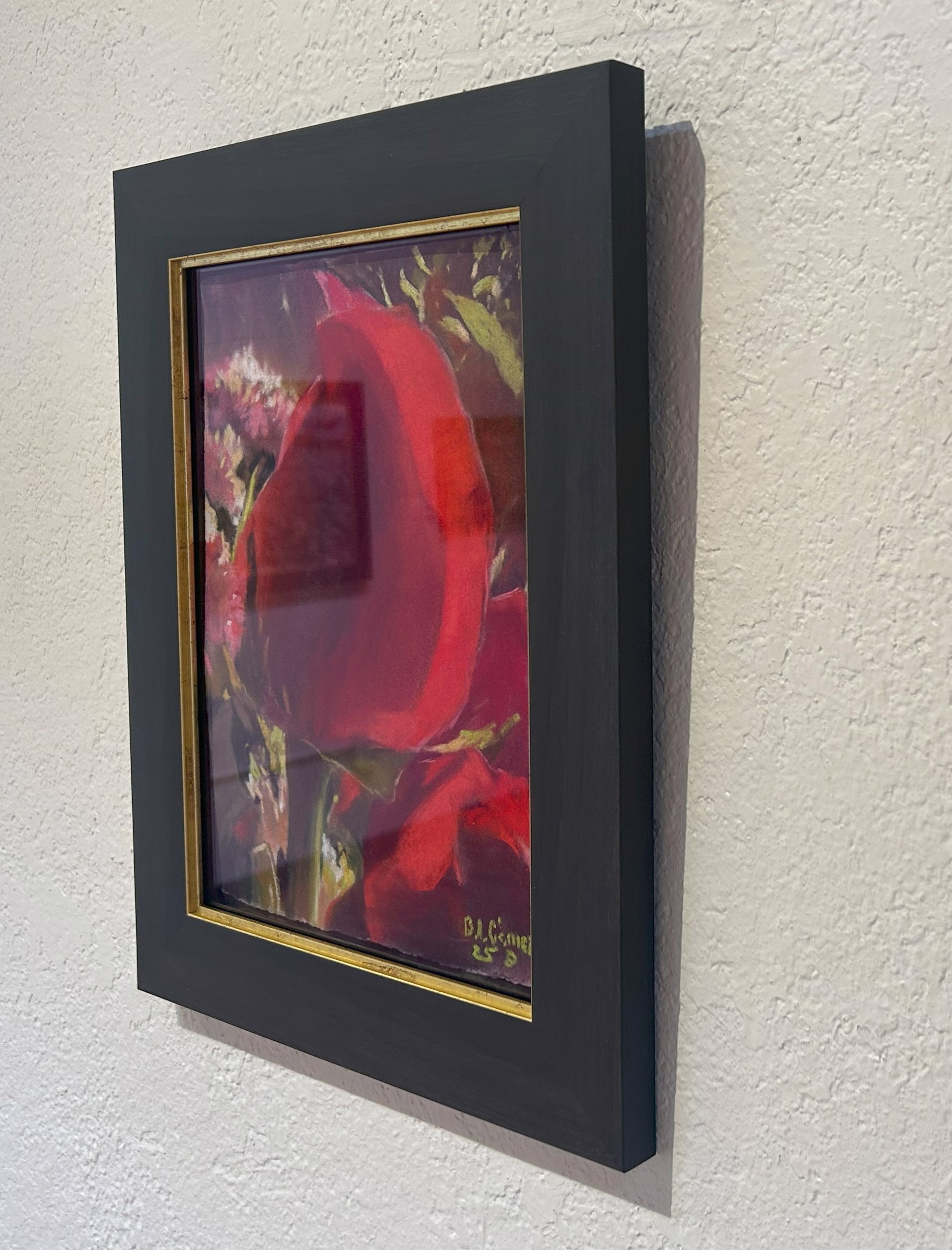 A painting of a red rose in a vase of flowers.