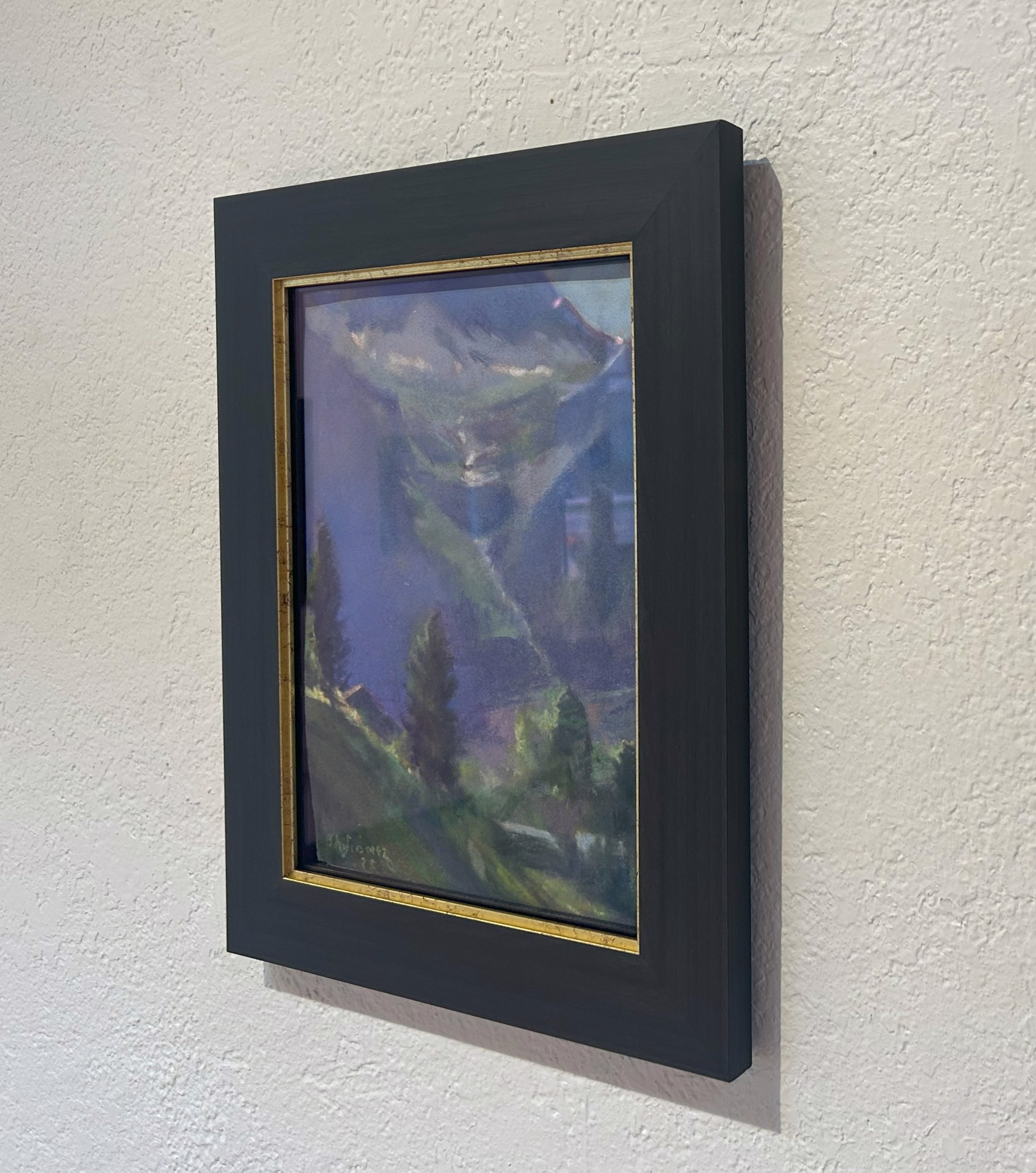 A painting of a mountain landscape with trees and mountains in the background.