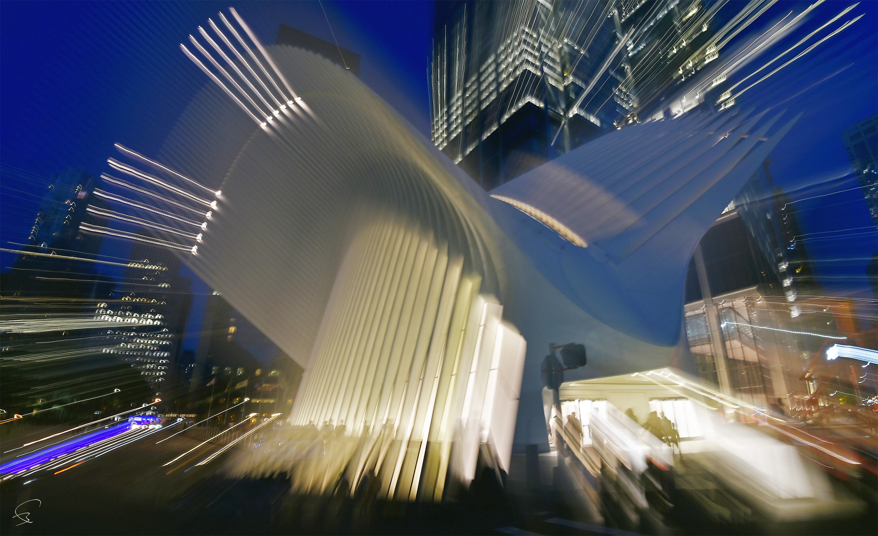 A long exposure shot of a city street at night.