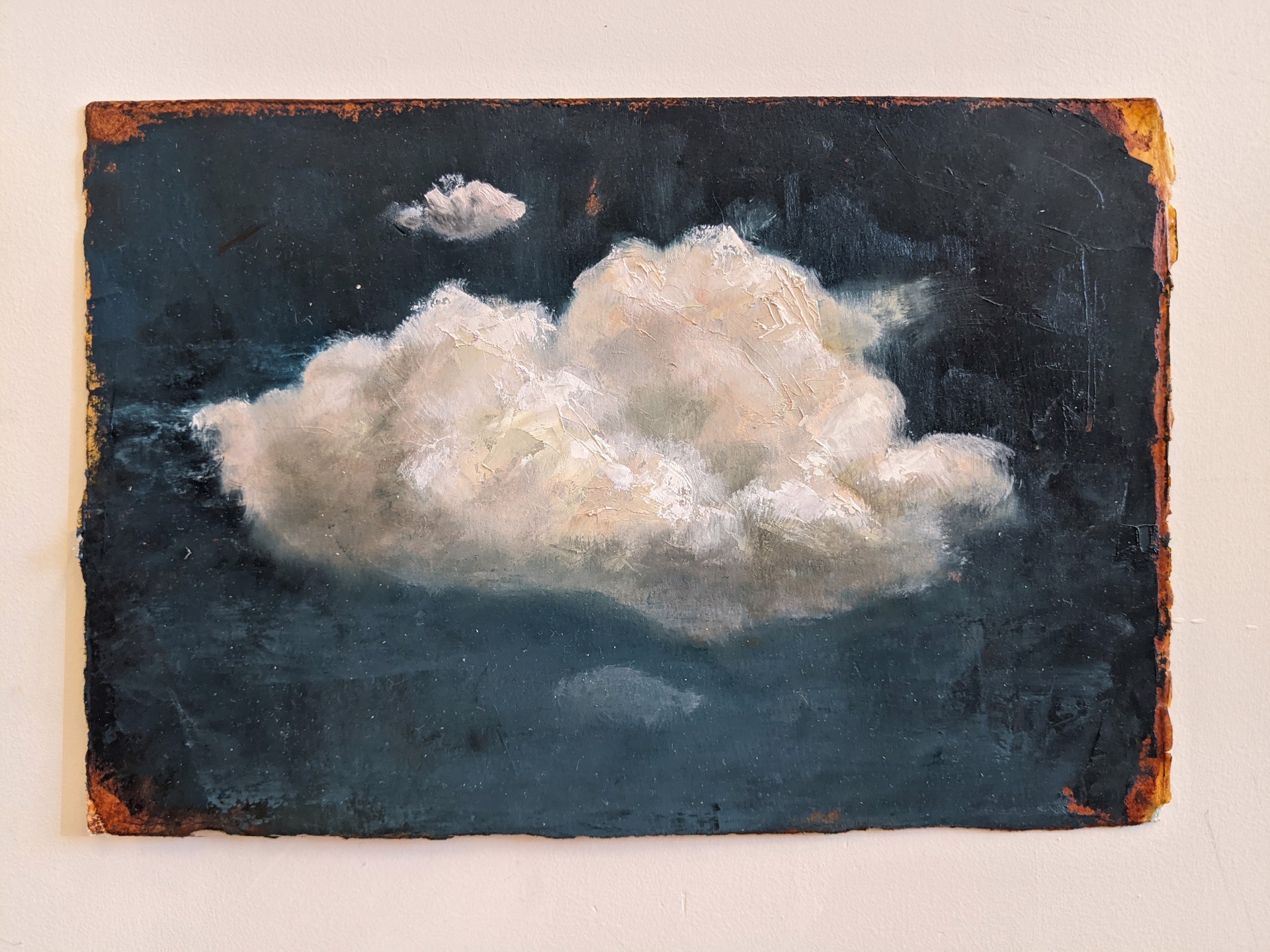 A painting of a white cloud in the sky.