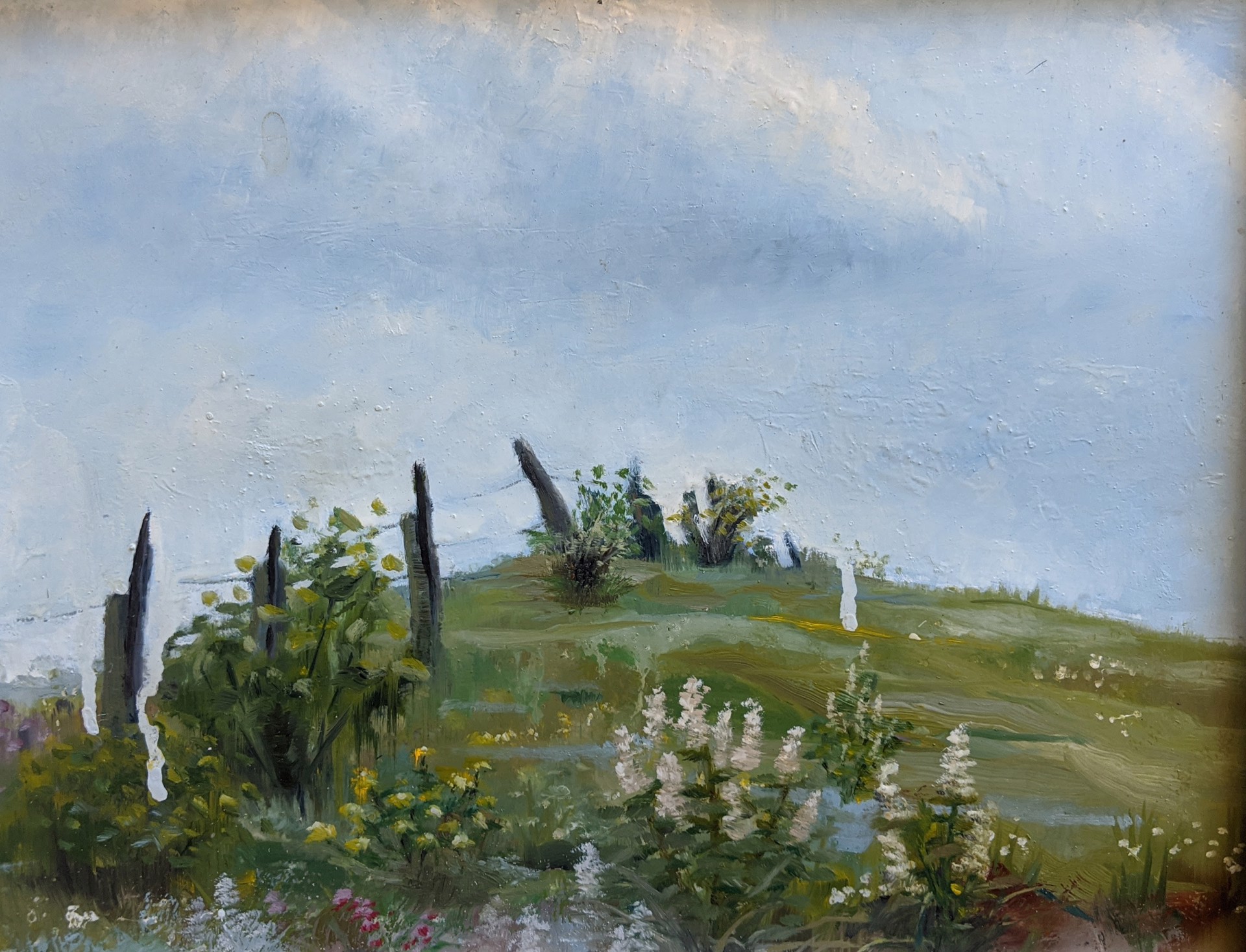 A pastoral landscape painting of a grassy hill with wildflowers and weathered wooden posts under a cloudy sky.