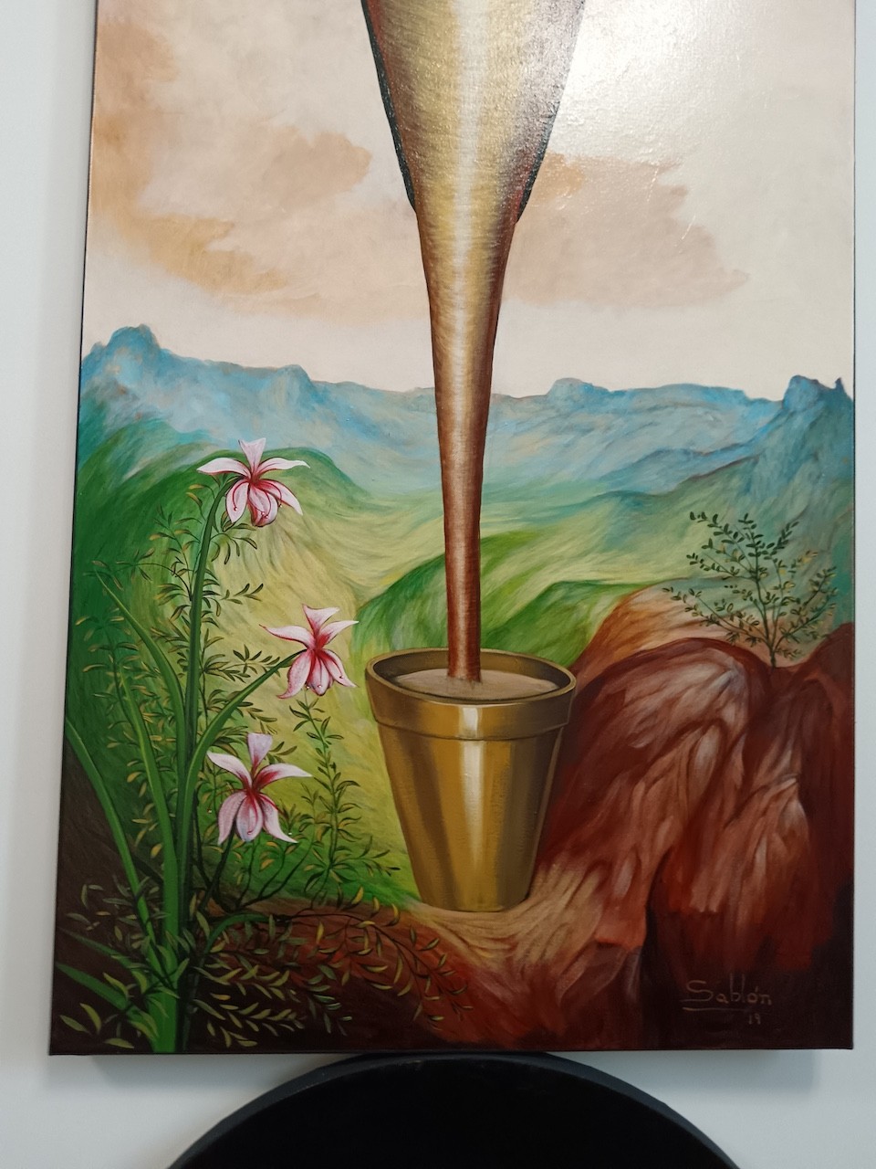 A painting of a palm tree with green feathers on it.