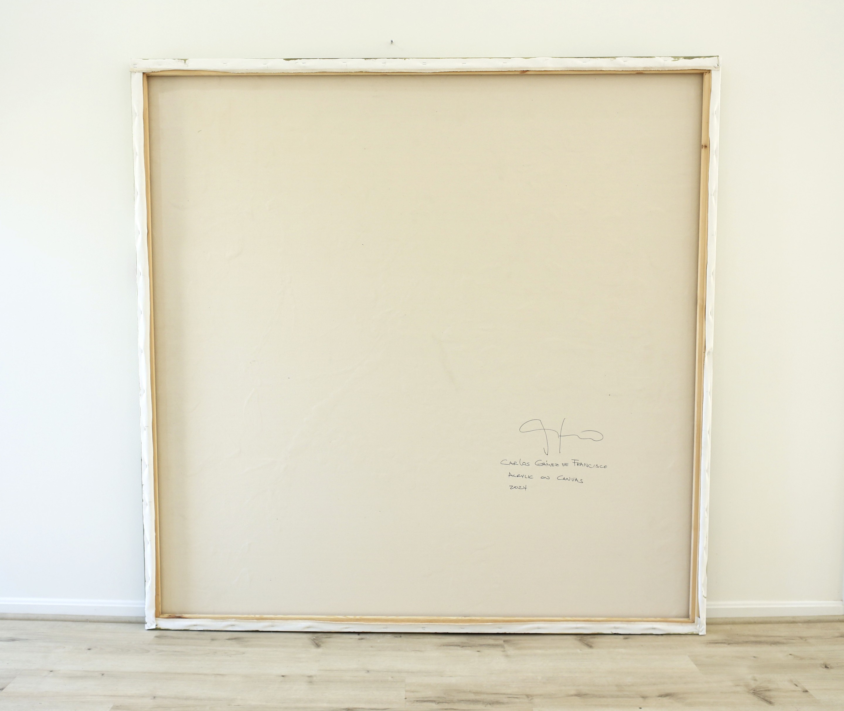 A picture frame with a drawing on it in a room.