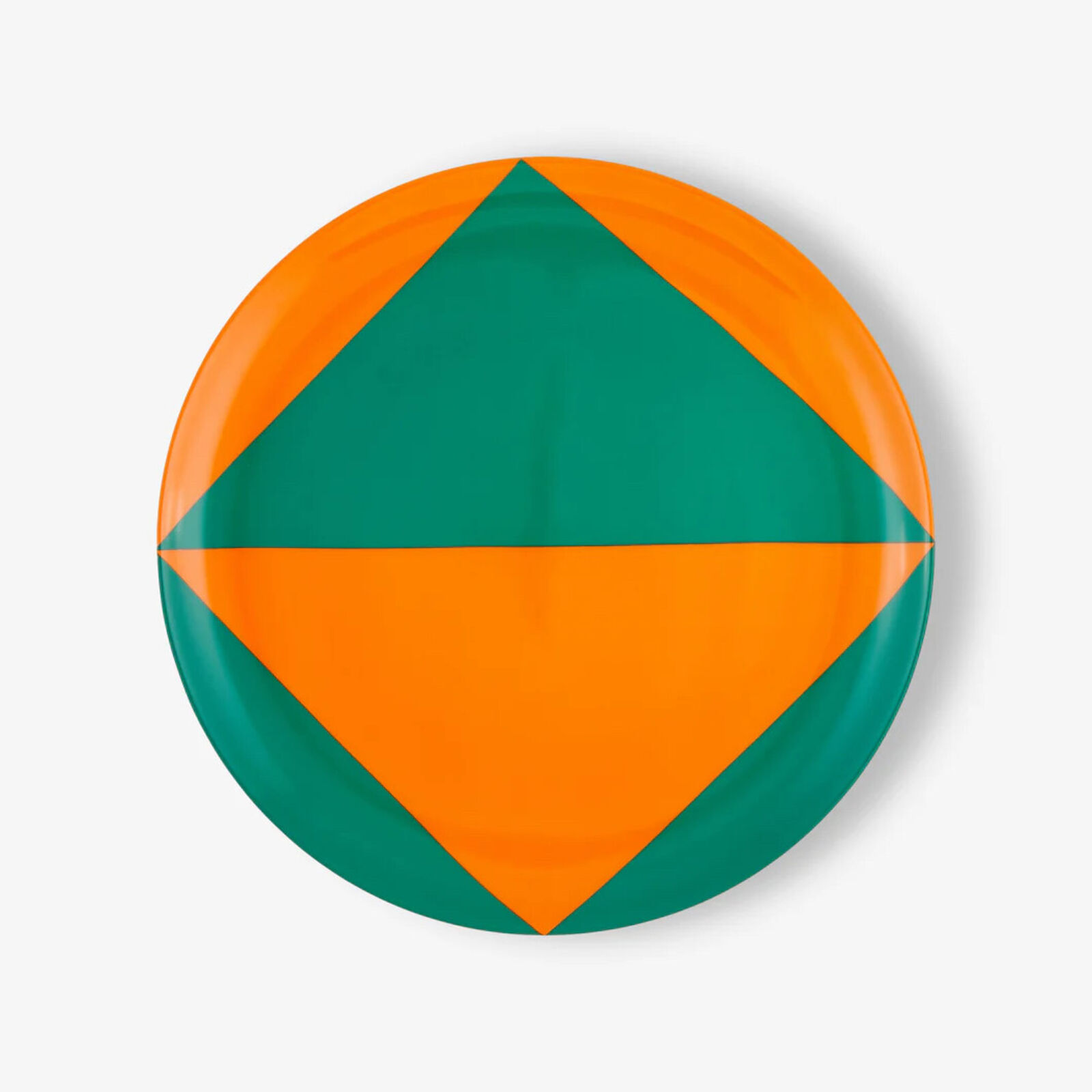 An orange and green plate with a triangle design on it.