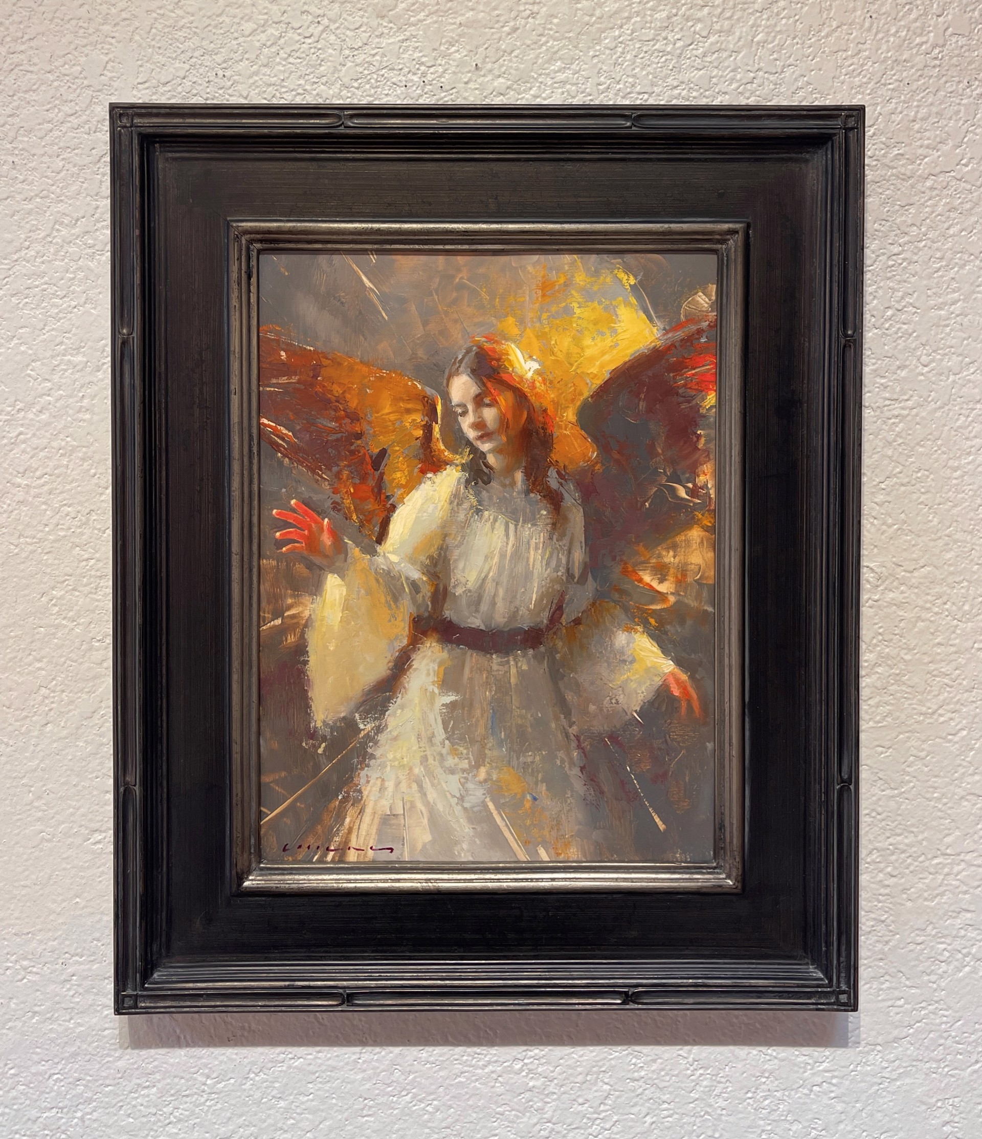 A painting of an angel in a white dress.