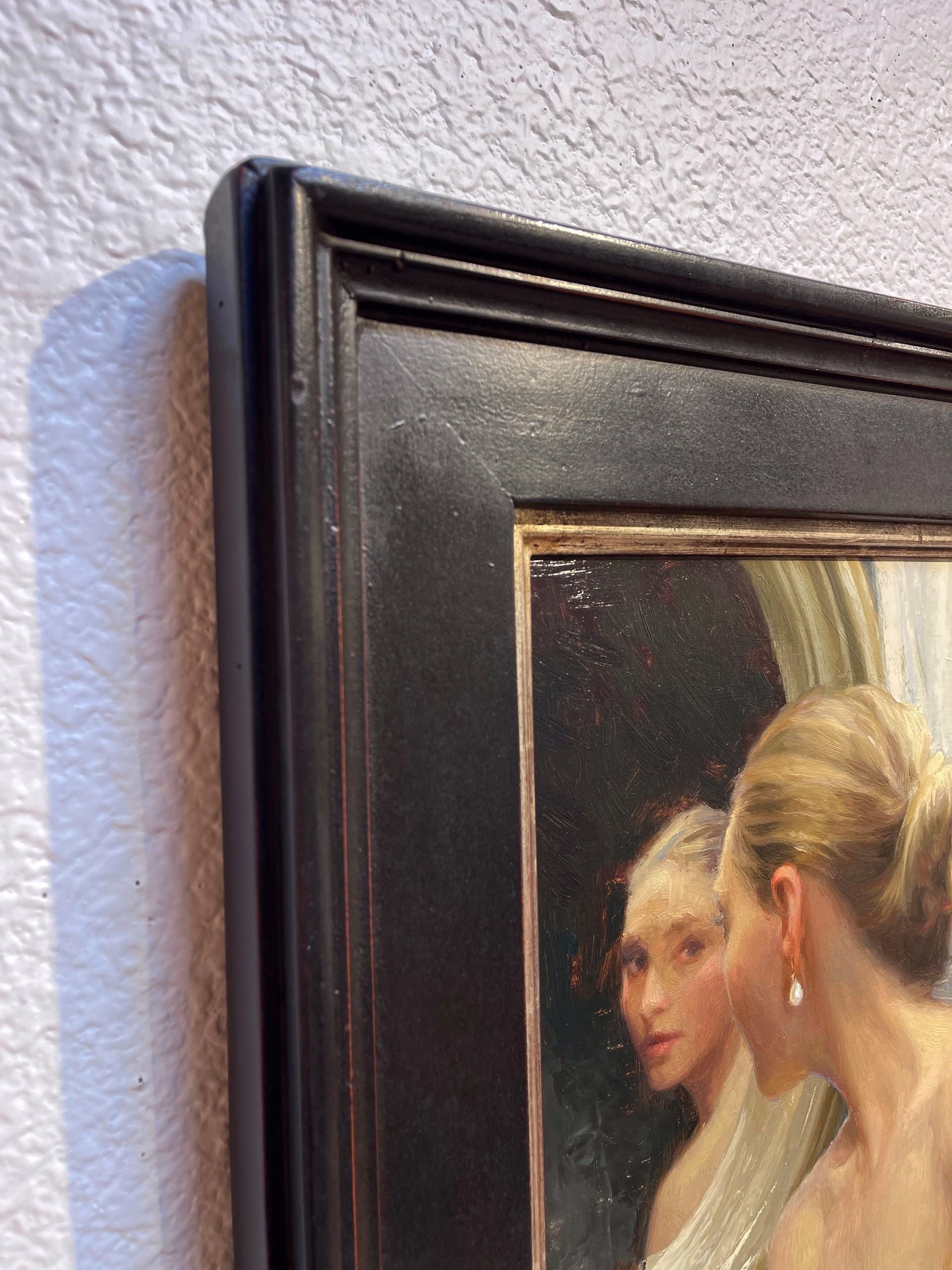 A painting of a woman looking at herself in the mirror.