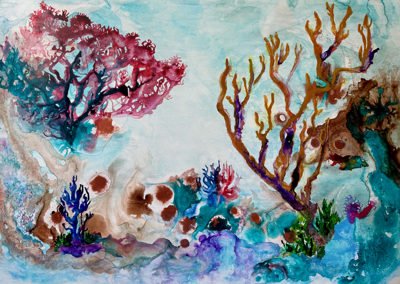 A vibrant underwater scene featuring colorful coral formations and marine life.